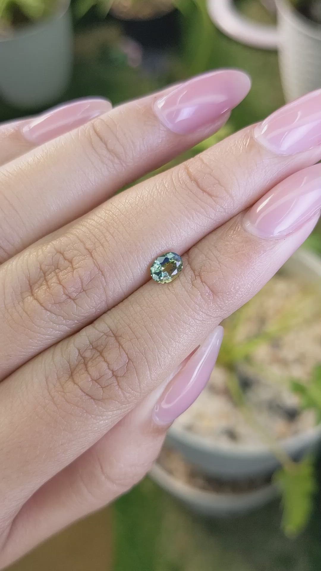 0.63 Ct. Yellowish Green Sapphire from Madagascar Size Video