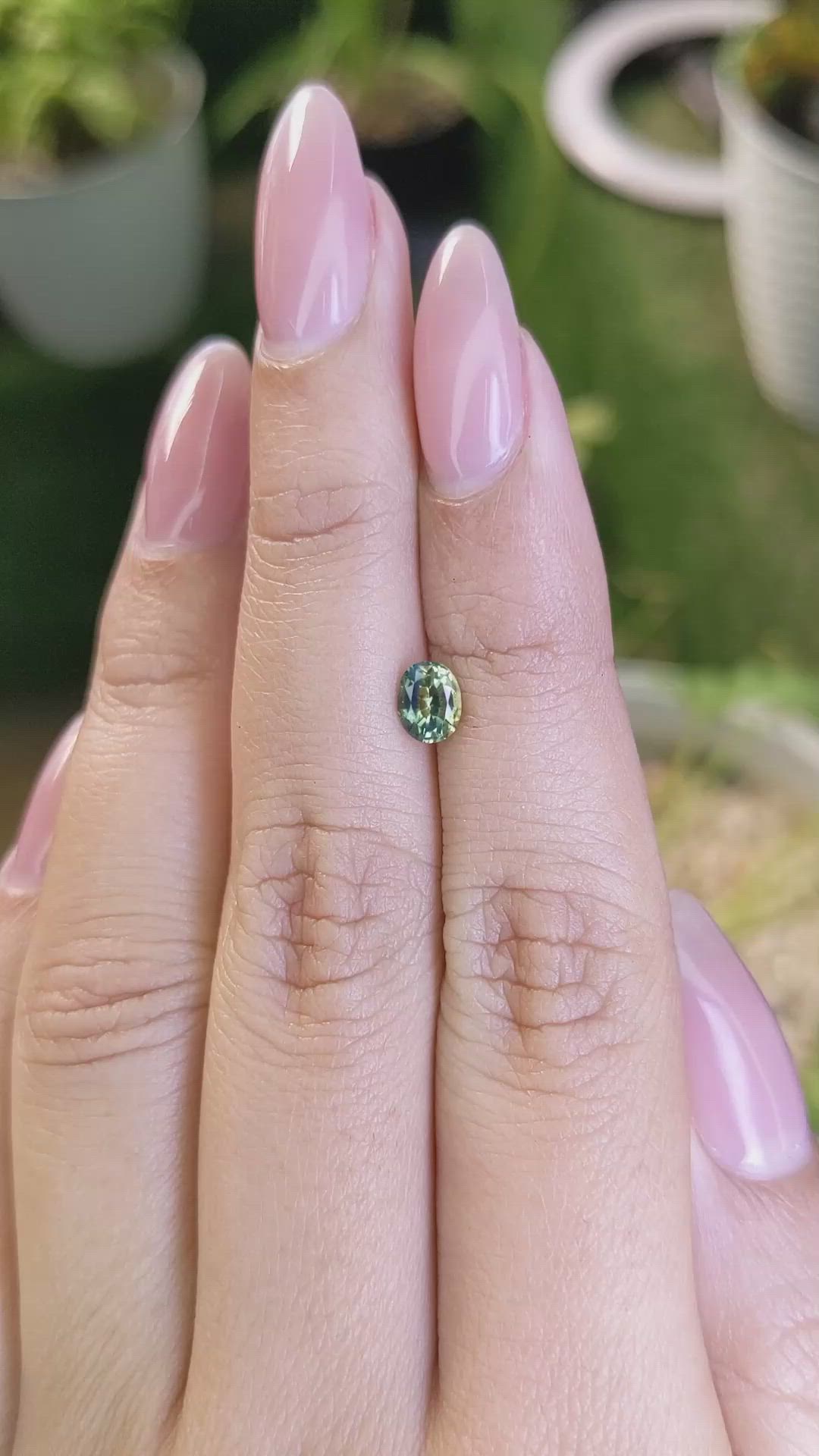 0.63 Ct. Yellowish Green Sapphire from Madagascar Size Video