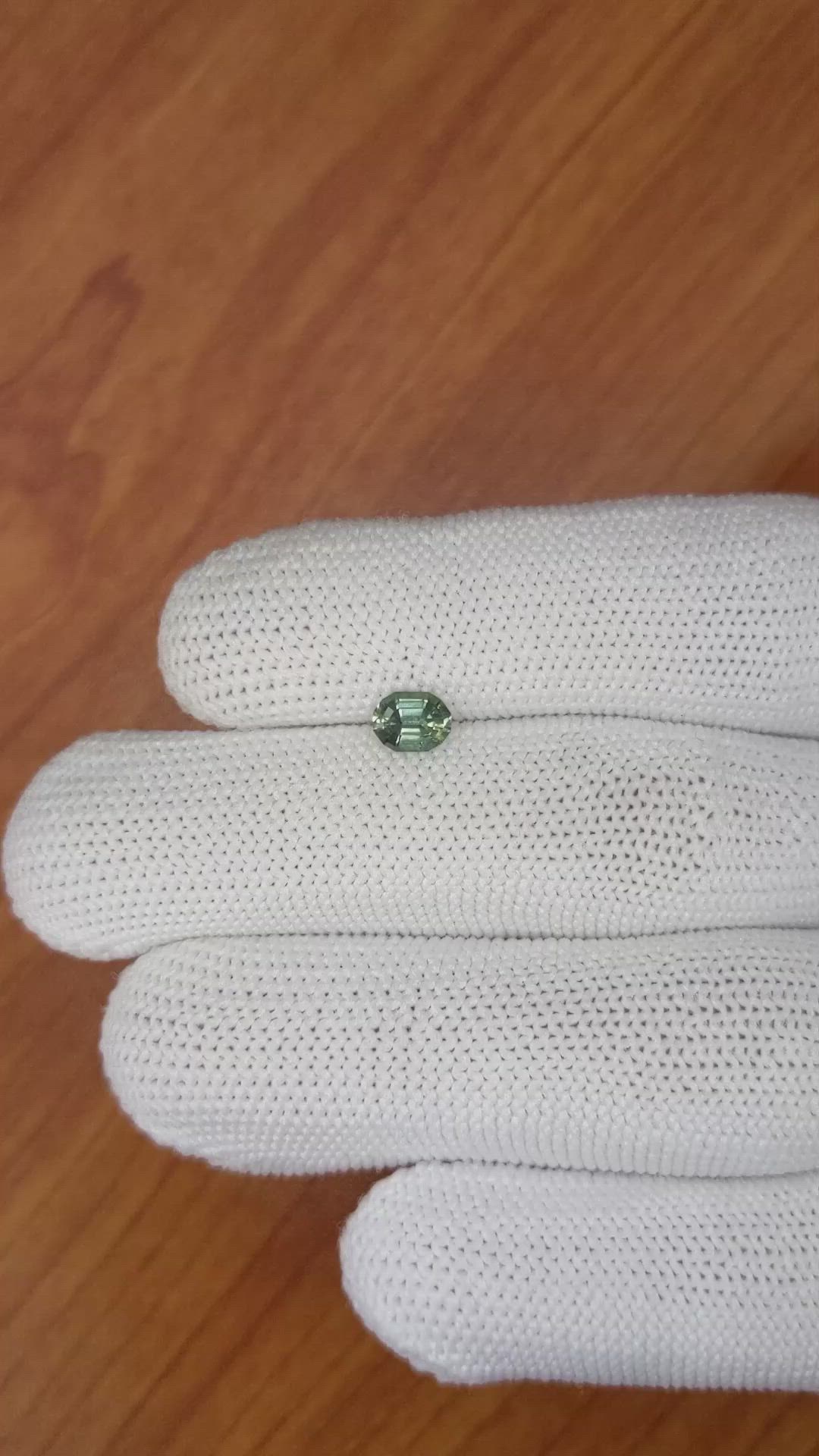 0.72 Ct. Yellowish Green Sapphire from Madagascar Size Video