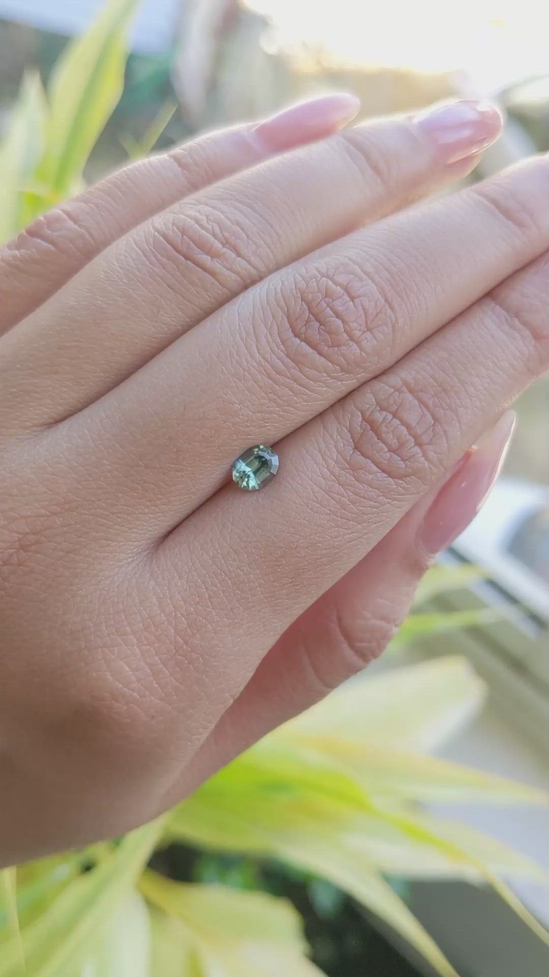 0.72 Ct. Yellowish Green Sapphire from Madagascar Size Video