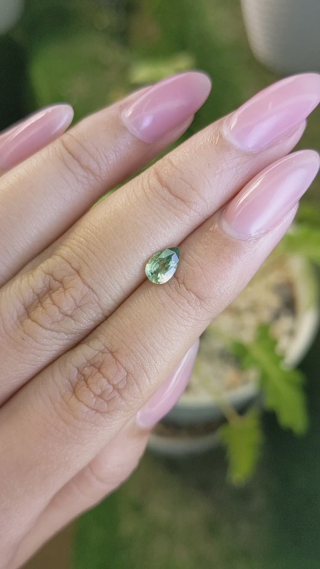 0.72 Ct. Yellowish Green Sapphire from Madagascar Size Video