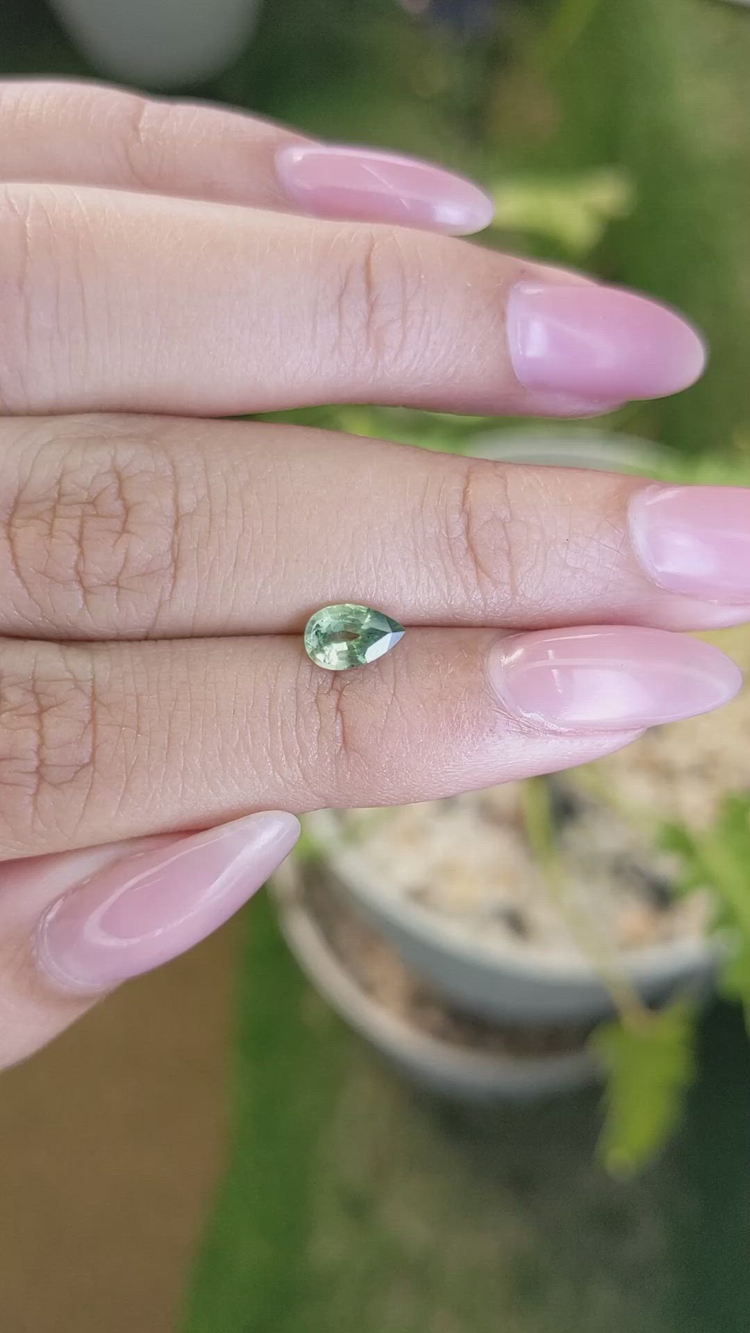 0.72 Ct. Yellowish Green Sapphire from Madagascar Size Video