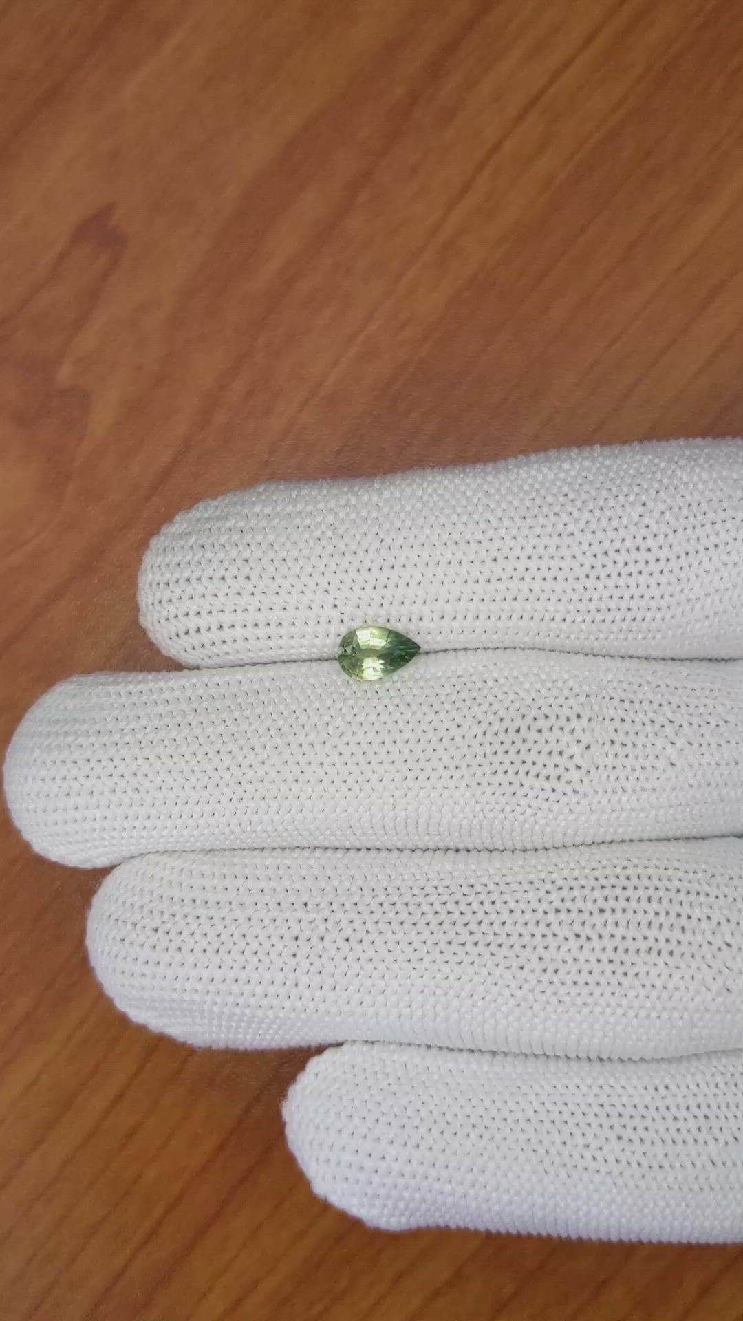 0.72 Ct. Yellowish Green Sapphire from Madagascar Size Video