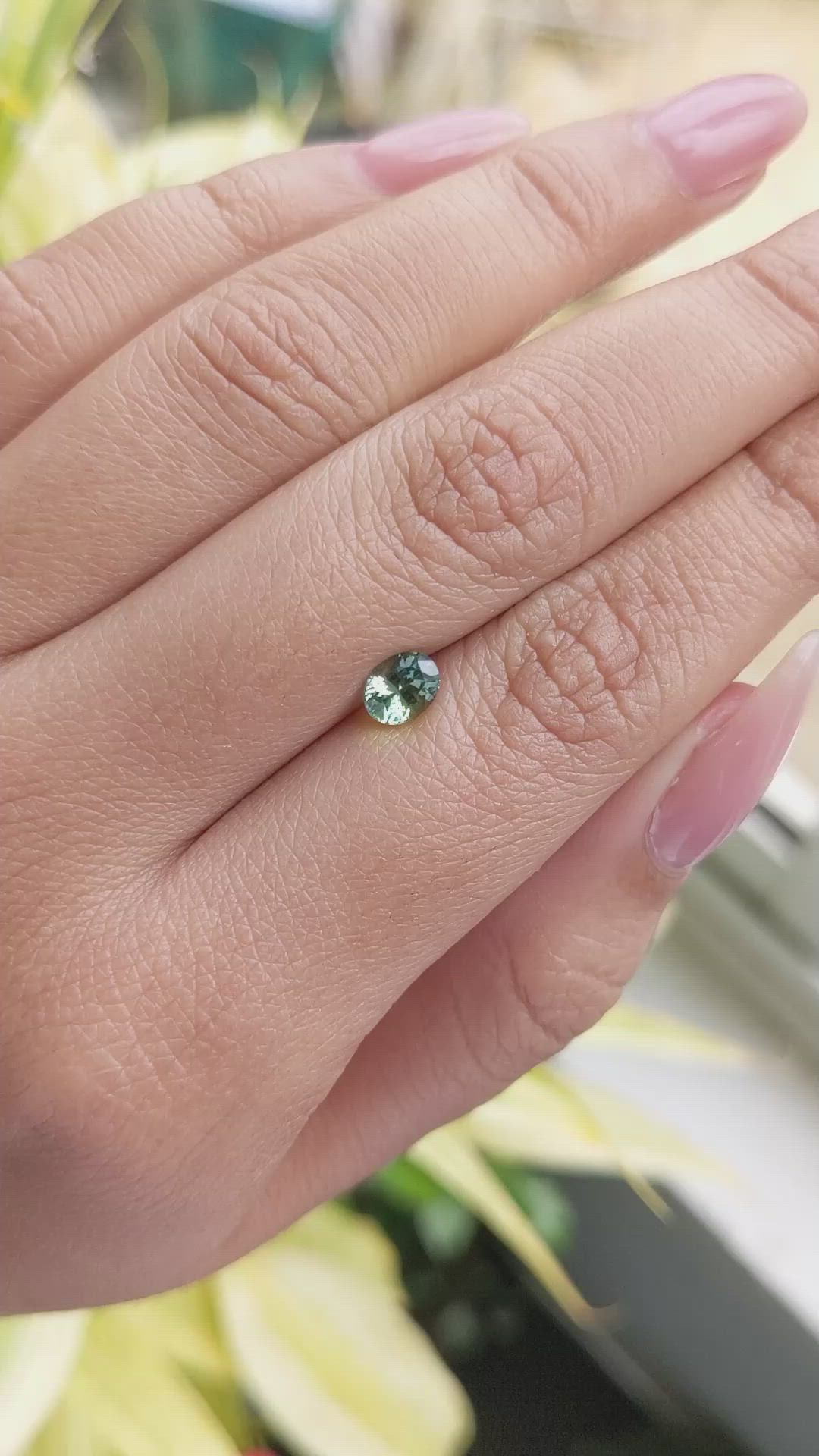 0.84 Ct. Yellowish Green Sapphire from Madagascar Size Video