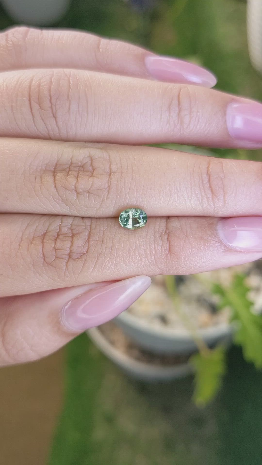 0.84 Ct. Yellowish Green Sapphire from Madagascar Size Video