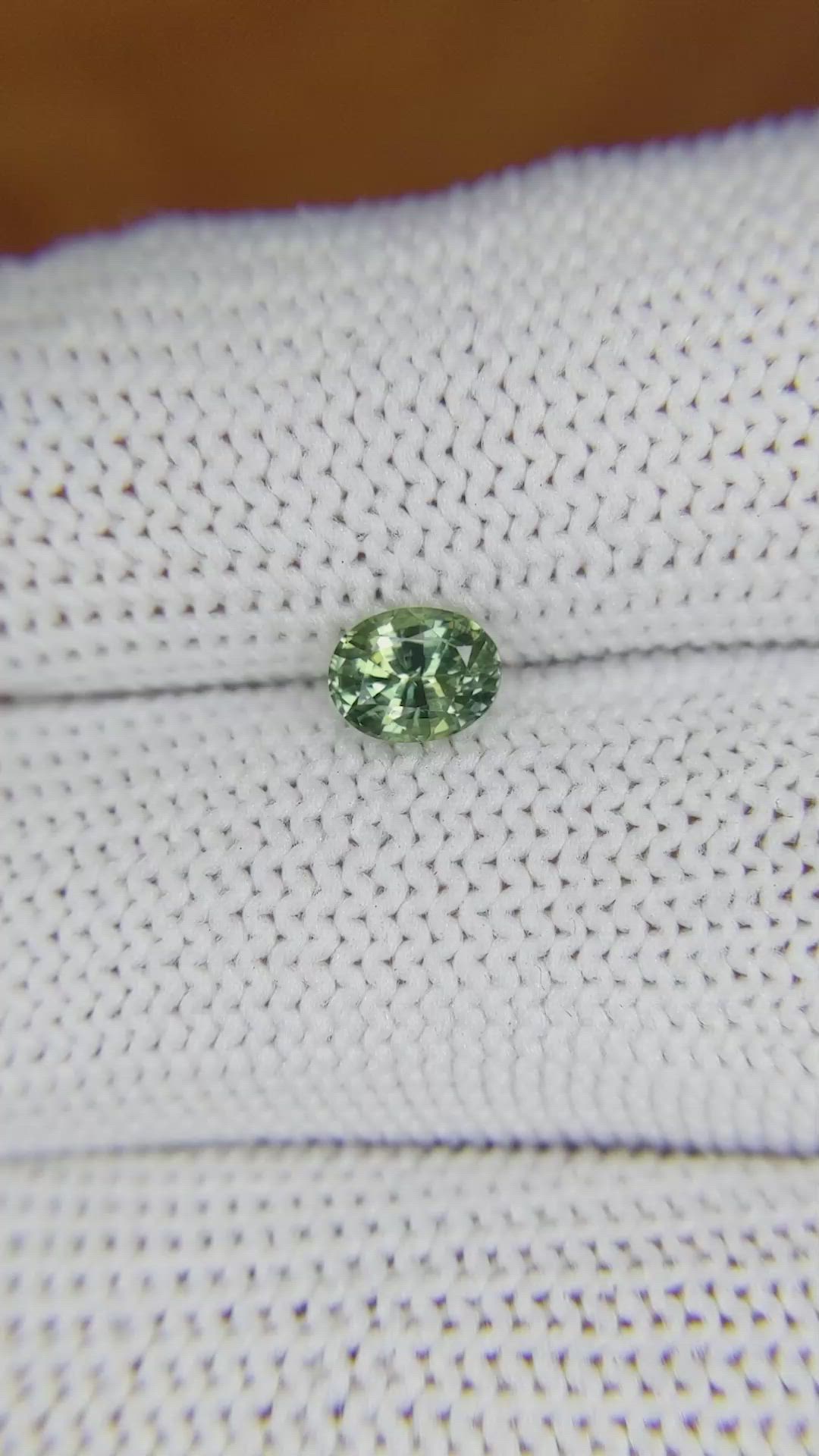 0.84 Ct. Yellowish Green Sapphire from Madagascar Size Video
