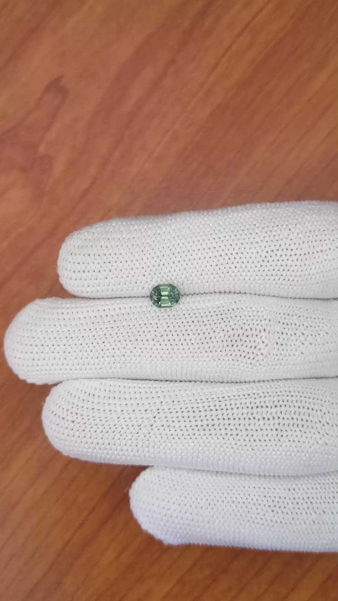 0.66 Ct. Bluish Green Sapphire from Madagascar Size Video