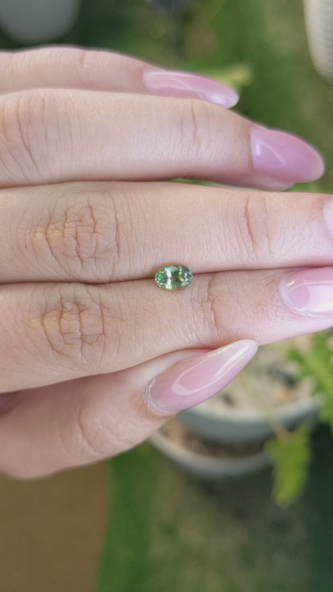 0.61 Ct. Yellowish Green Sapphire from Madagascar Size Video