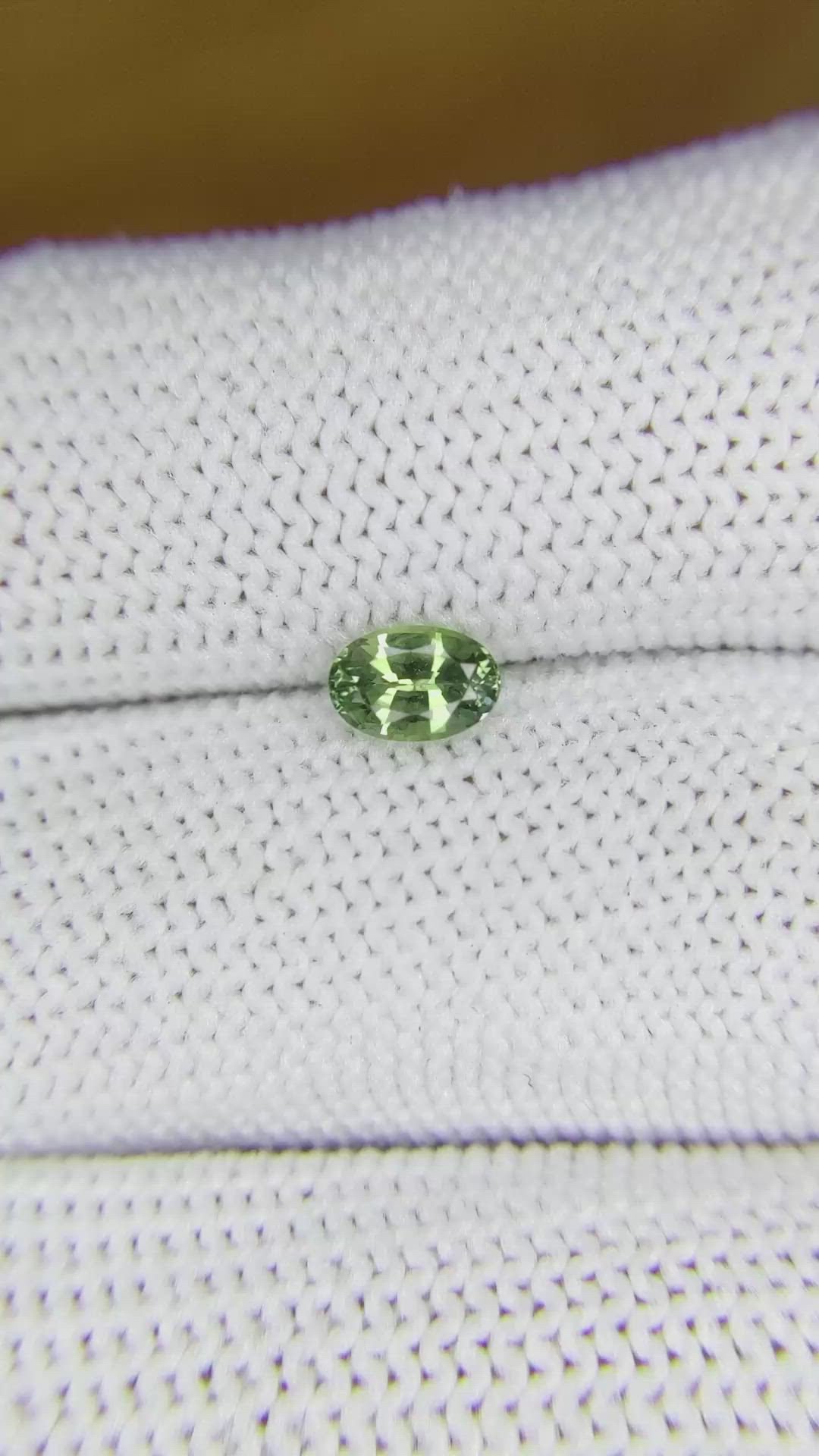 0.61 Ct. Yellowish Green Sapphire from Madagascar Size Video