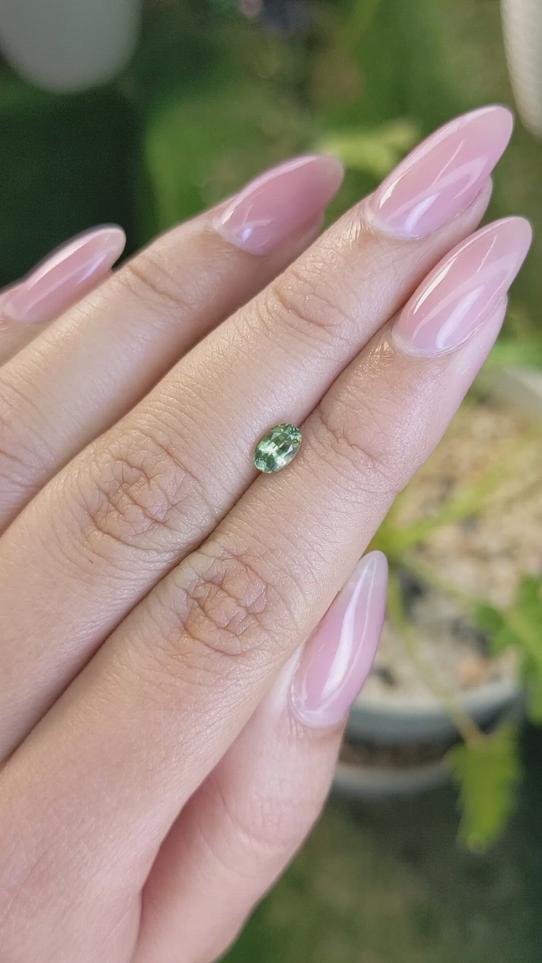 0.61 Ct. Yellowish Green Sapphire from Madagascar Size Video