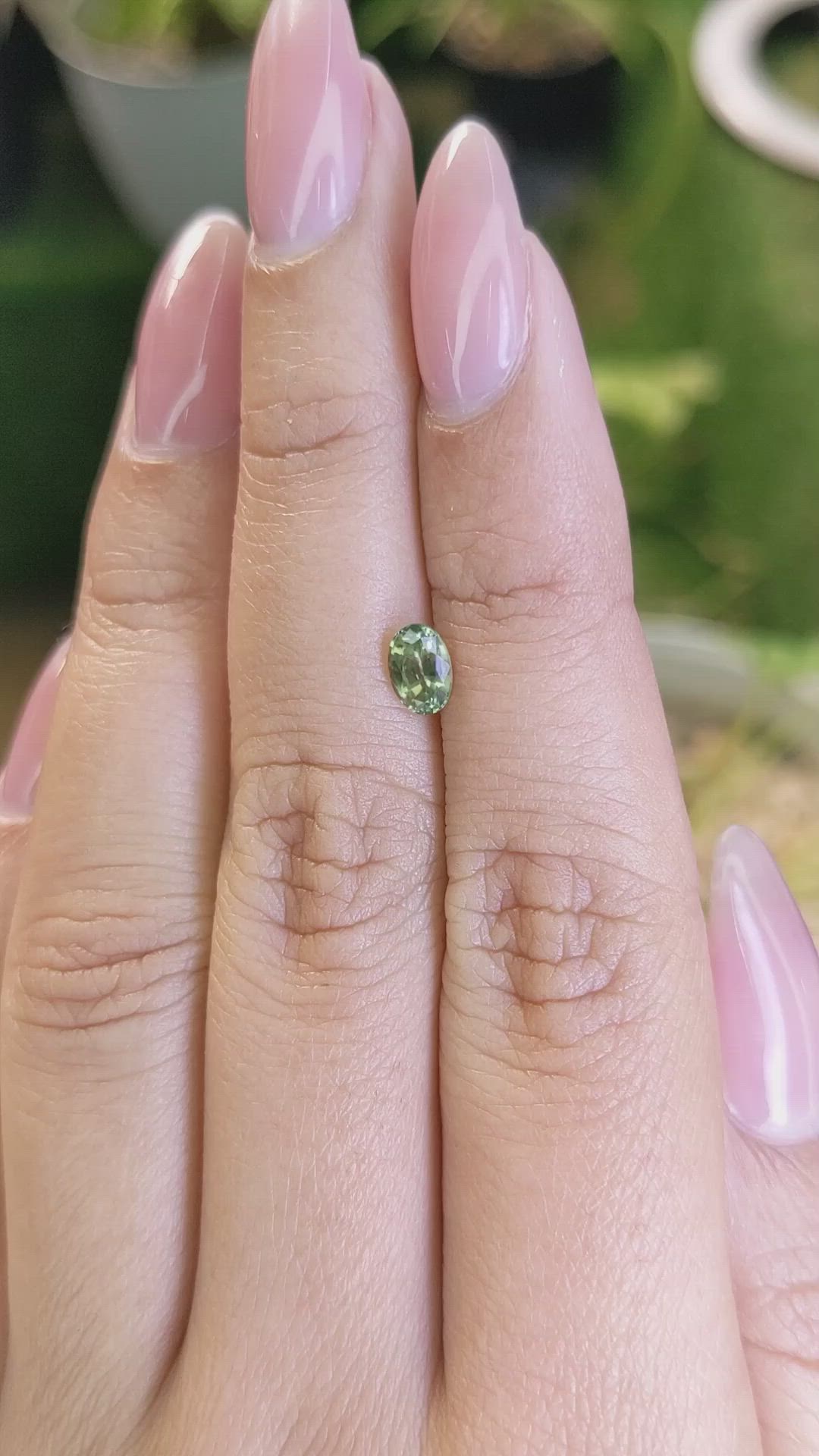 0.61 Ct. Yellowish Green Sapphire from Madagascar Size Video