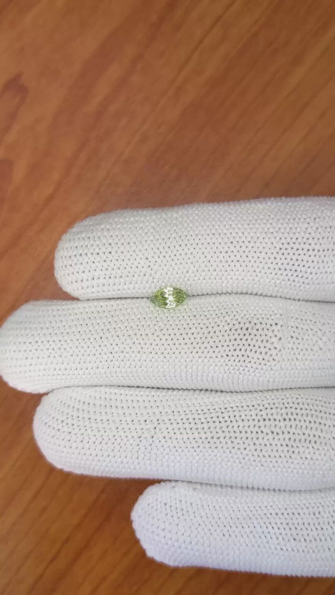 0.55 Ct. Yellowish Green Sapphire from Madagascar Size Video