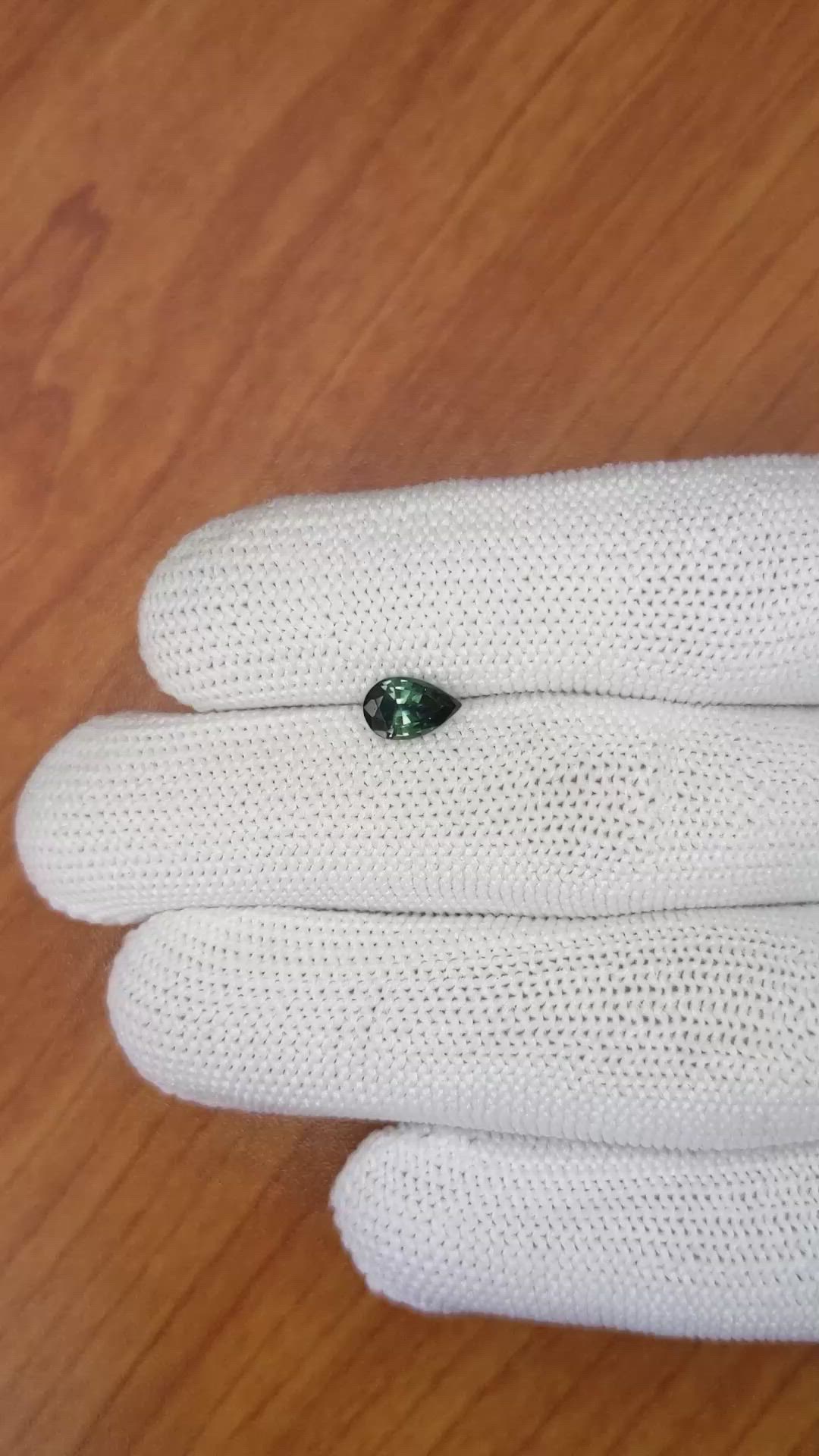 0.95 Ct. Bluish Green Sapphire from Madagascar Size Video