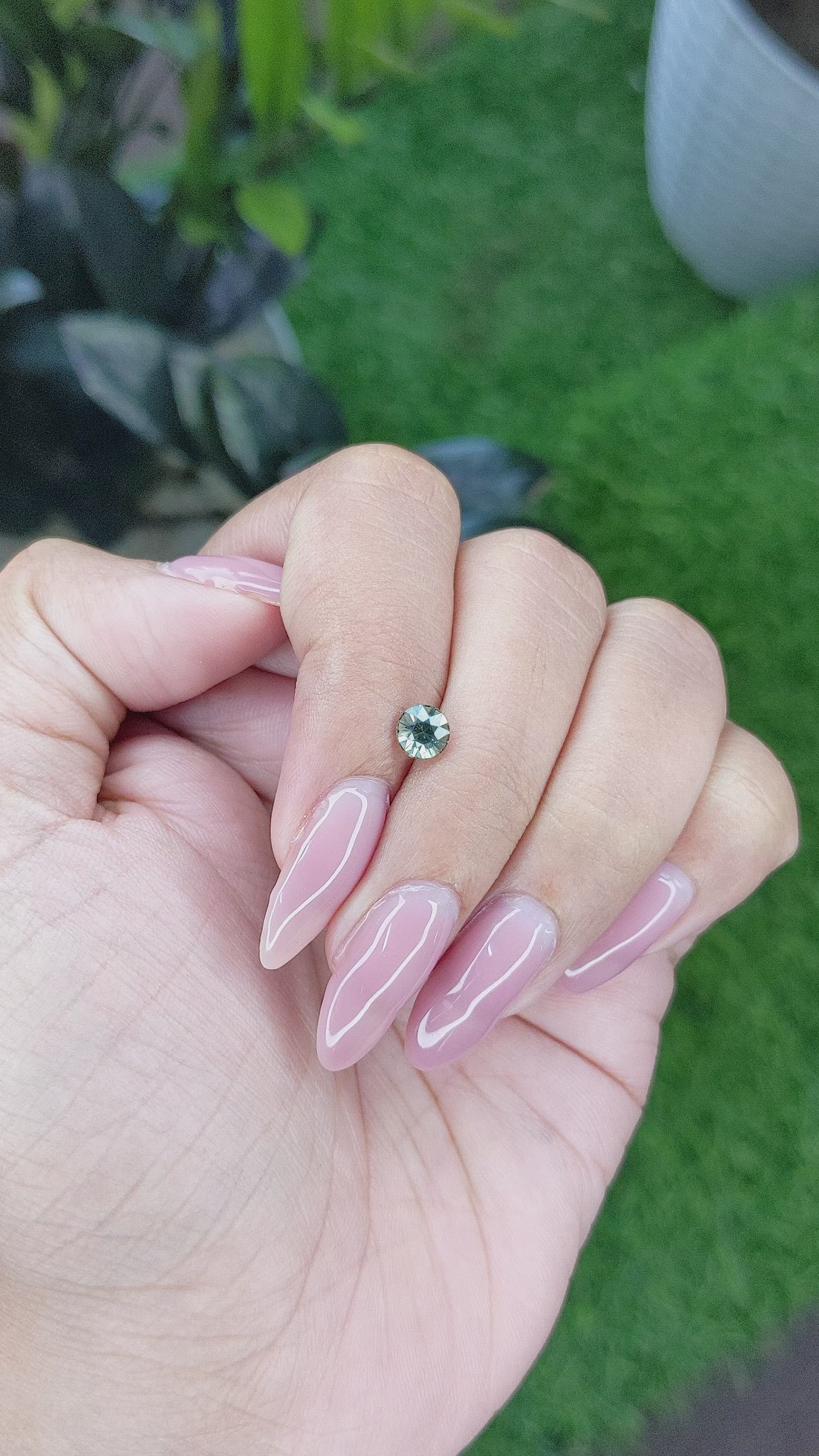 0.76 Ct. Bluish Green Sapphire from Madagascar Size Video