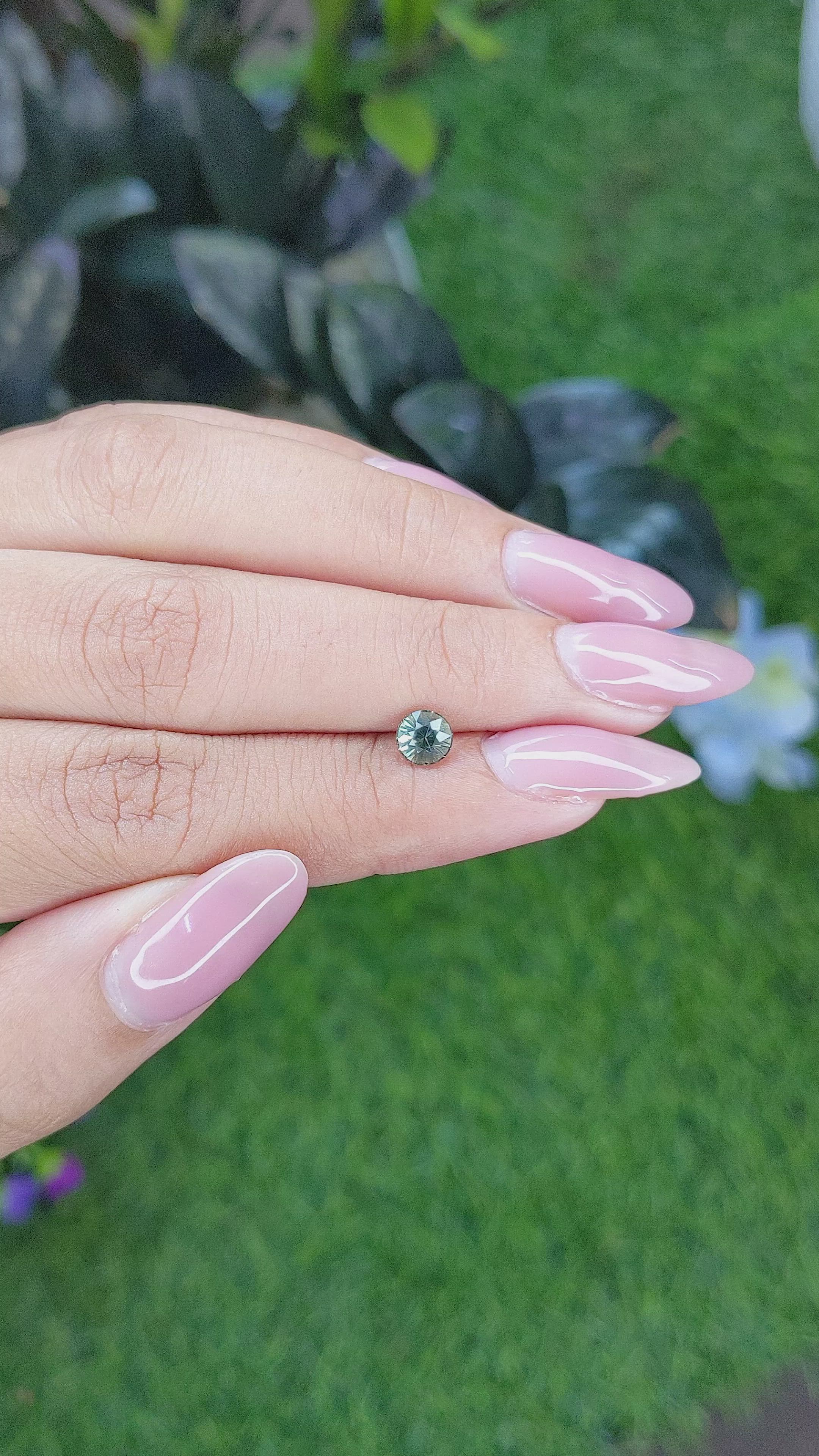 0.76 Ct. Bluish Green Sapphire from Madagascar Size Video