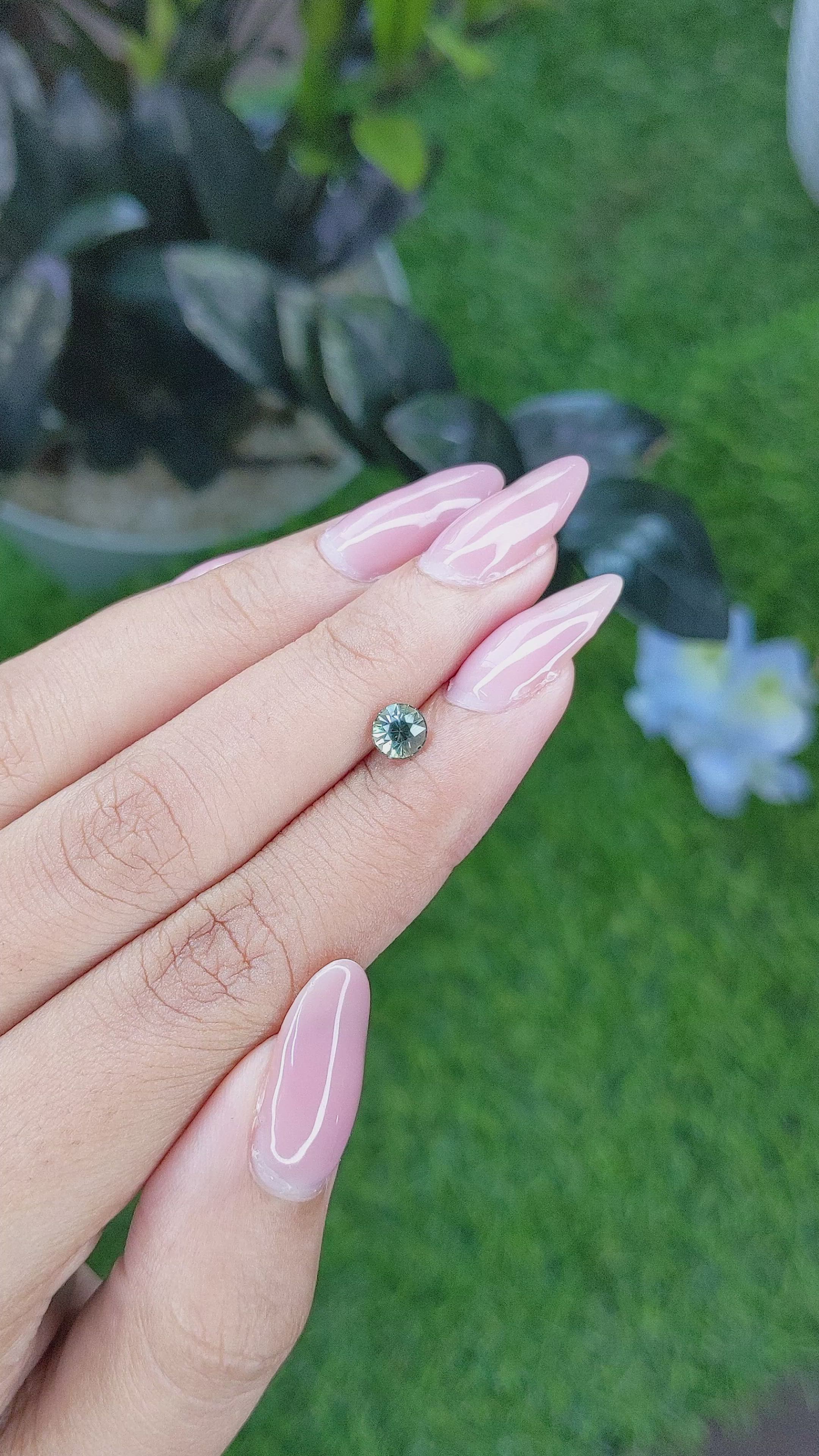 0.76 Ct. Bluish Green Sapphire from Madagascar Size Video