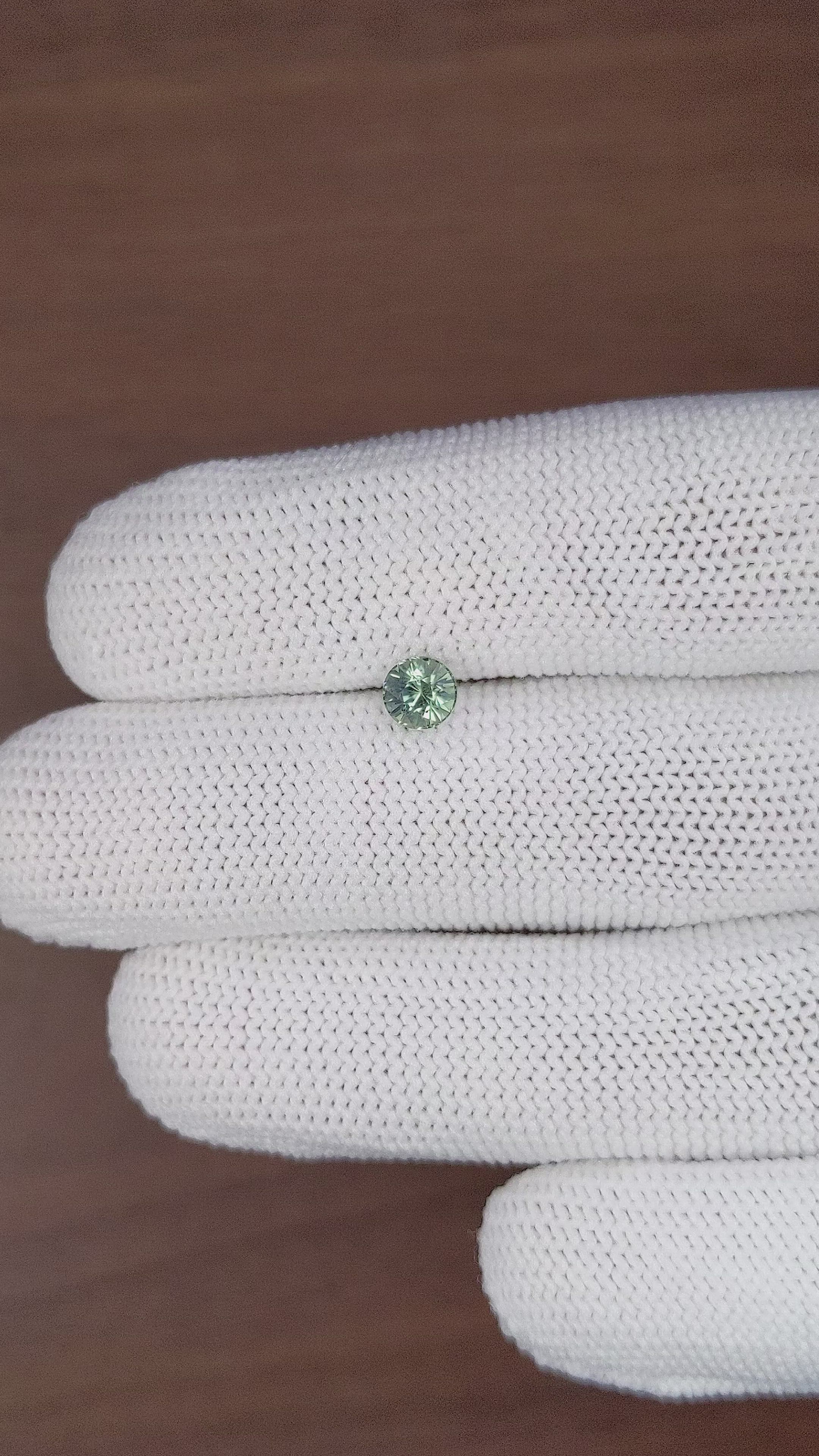0.76 Ct. Bluish Green Sapphire from Madagascar Size Video