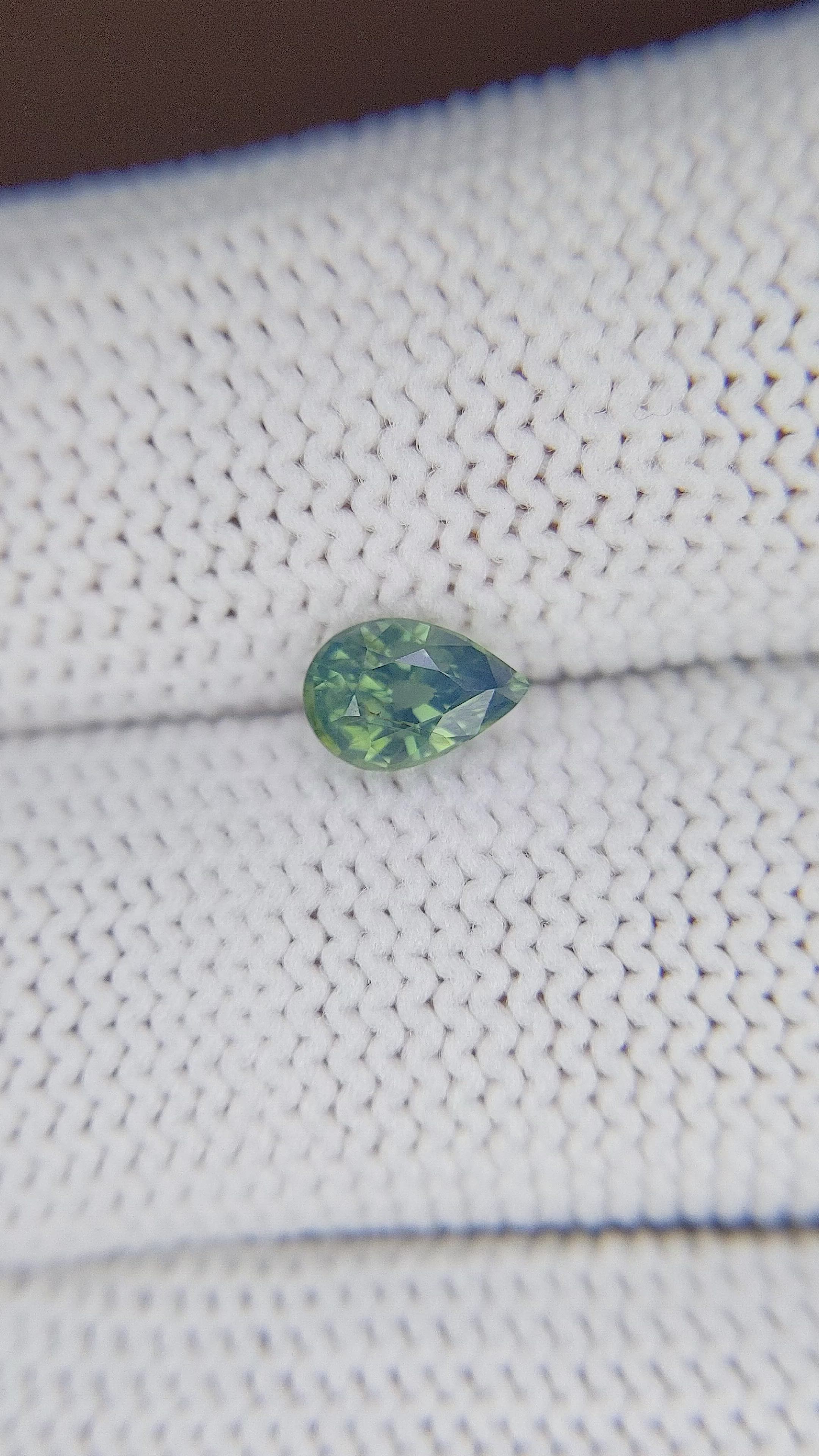 0.79 Ct. Bluish Green Sapphire from Madagascar Size Video