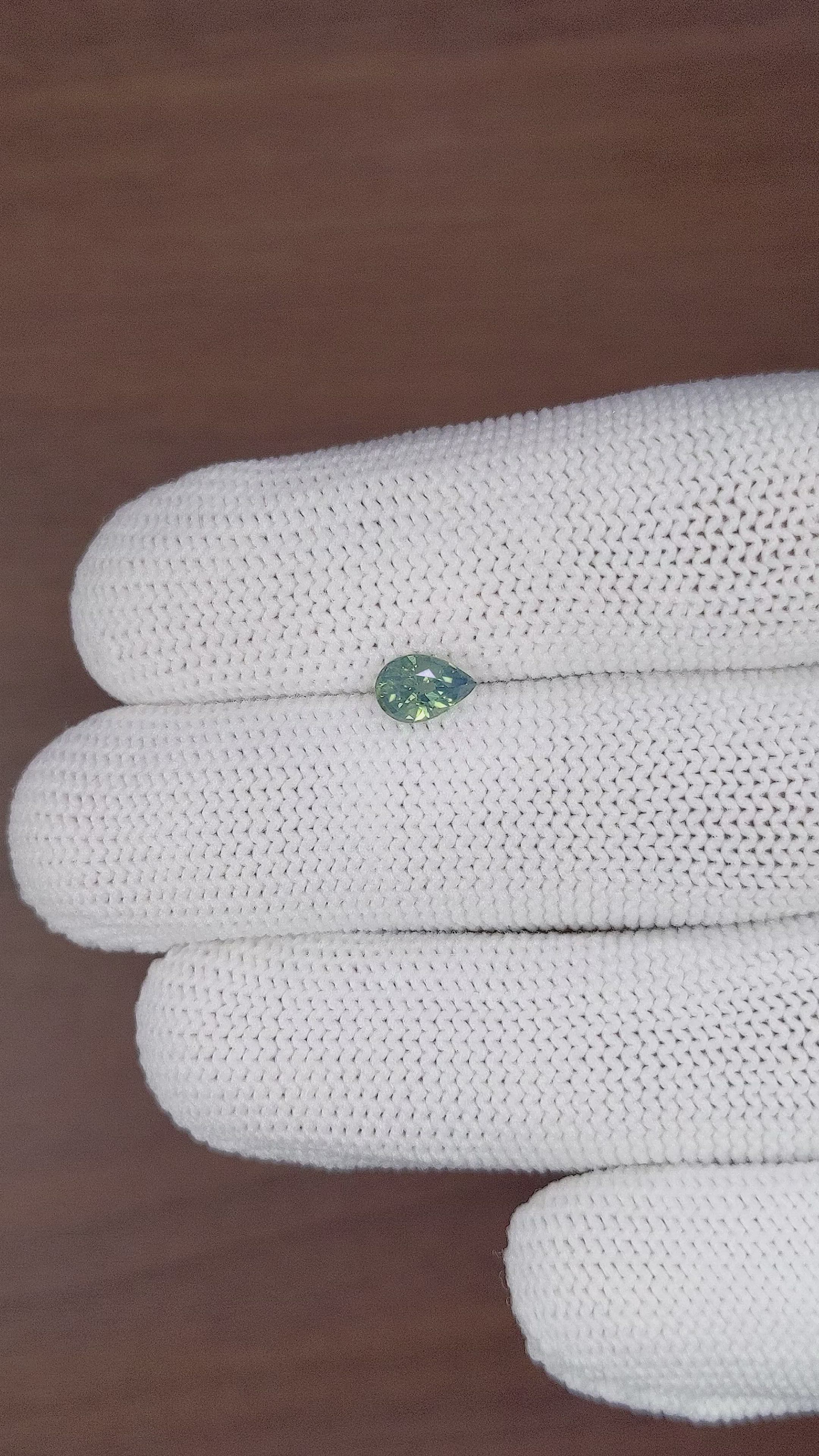 0.79 Ct. Bluish Green Sapphire from Madagascar Size Video