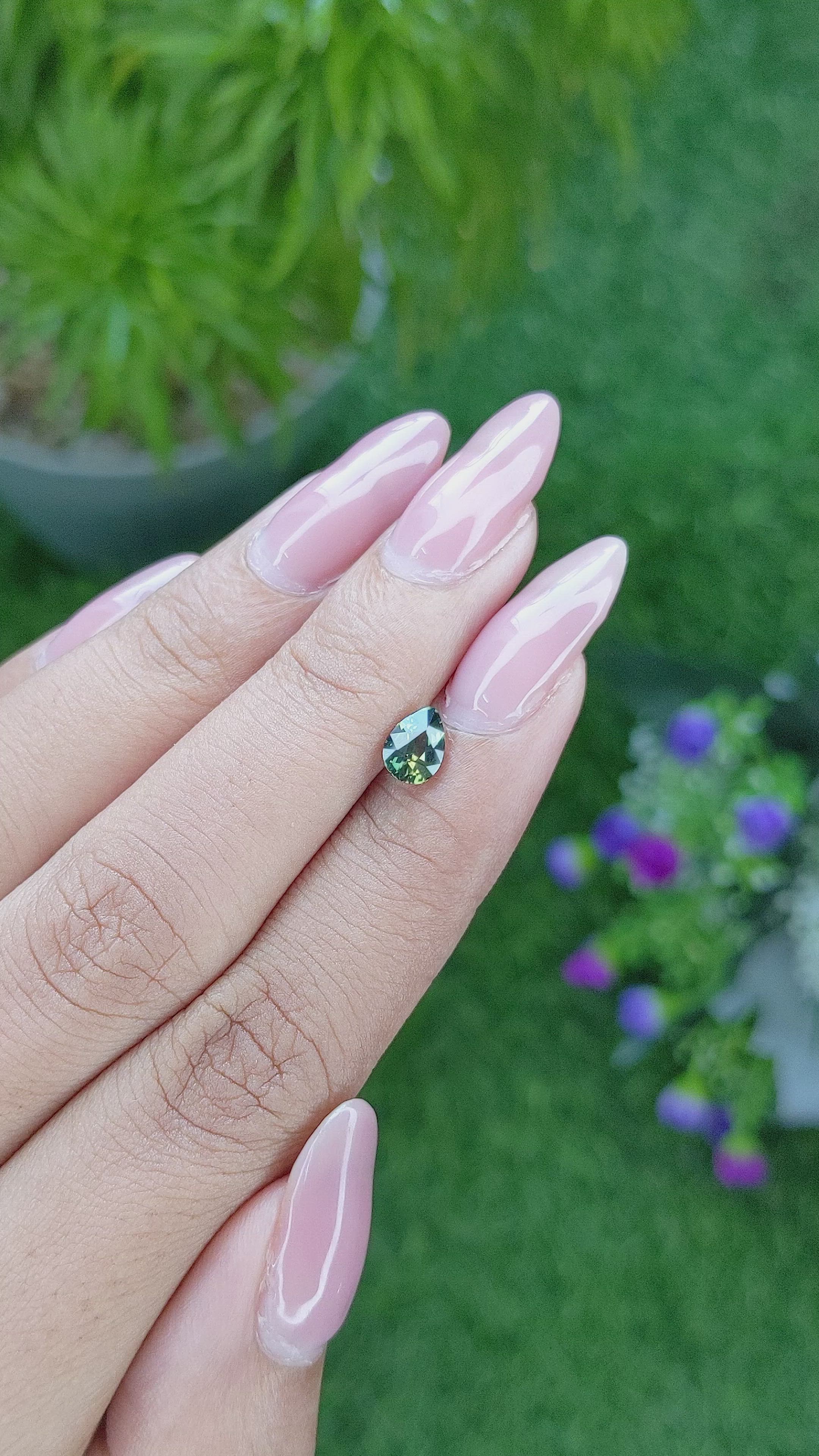 0.81 Ct. Yellowish Green Sapphire from Madagascar Size Video