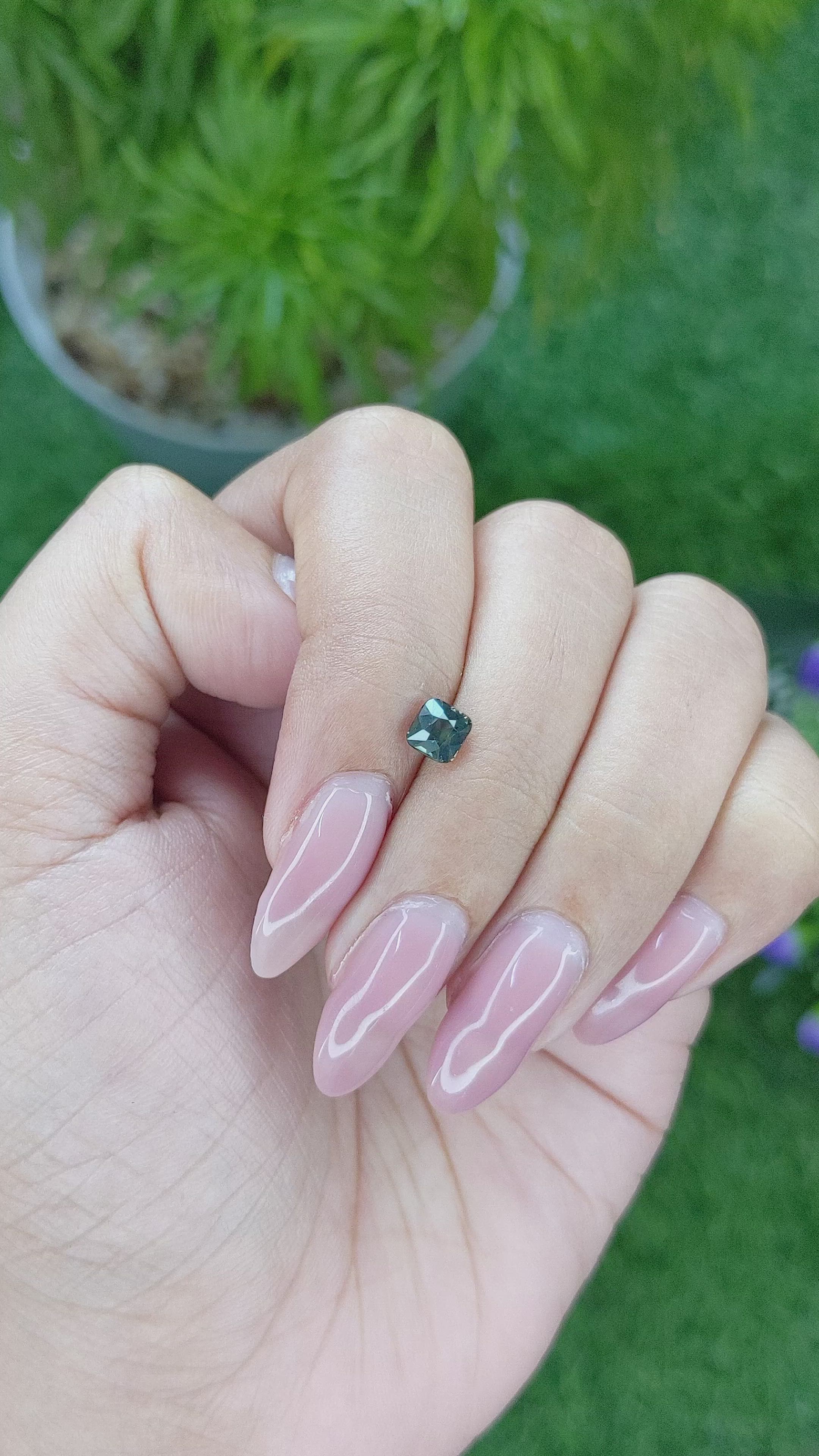 0.82 Ct. Bluish Green Sapphire from Madagascar Size Video