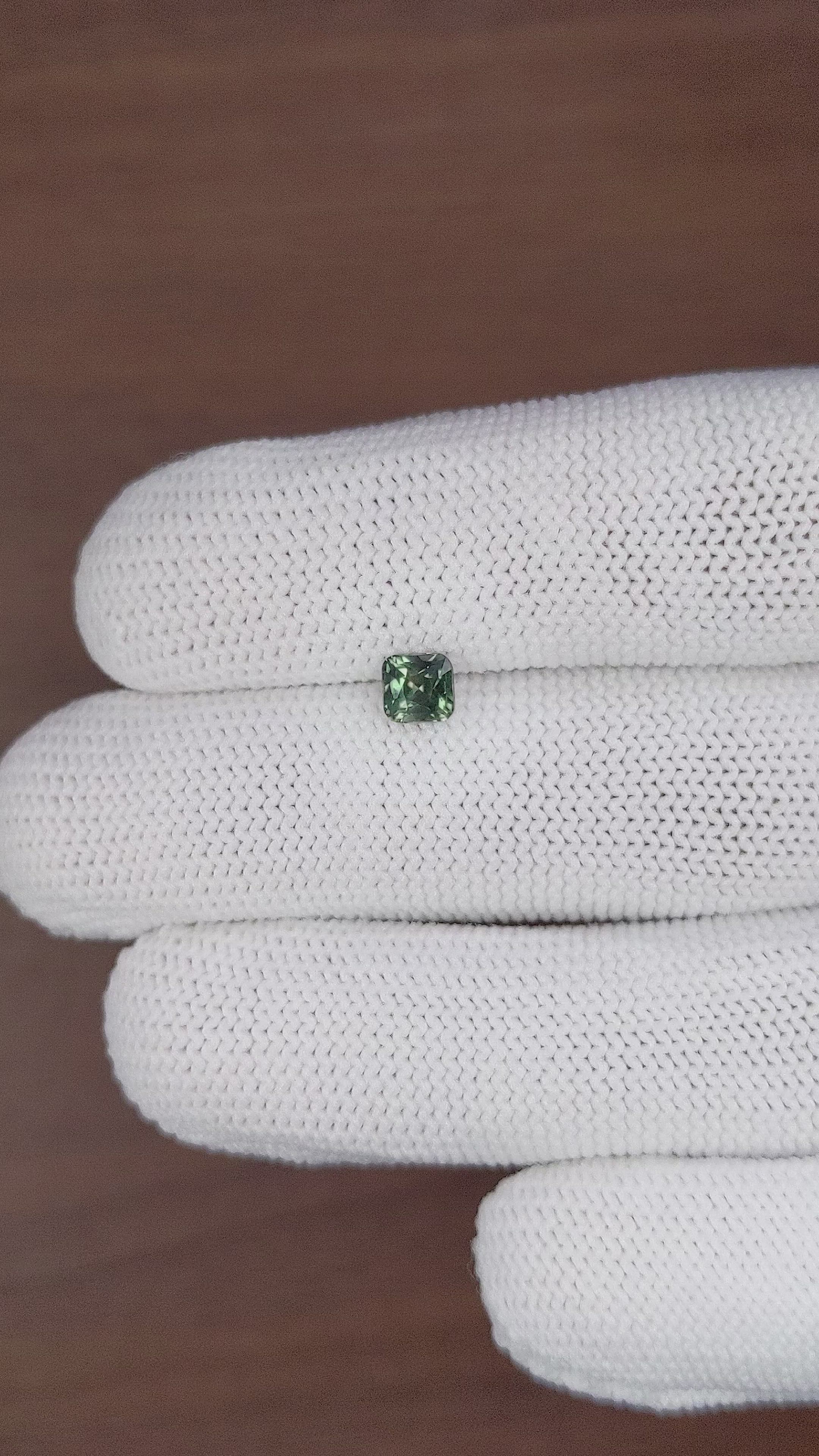 0.82 Ct. Bluish Green Sapphire from Madagascar Size Video