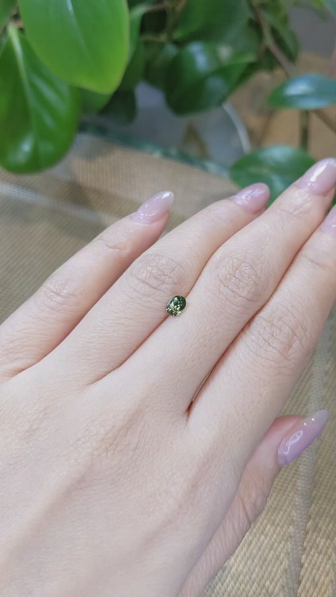 0.49 Ct. Yellowish Green Sapphire from Madagascar Size Video