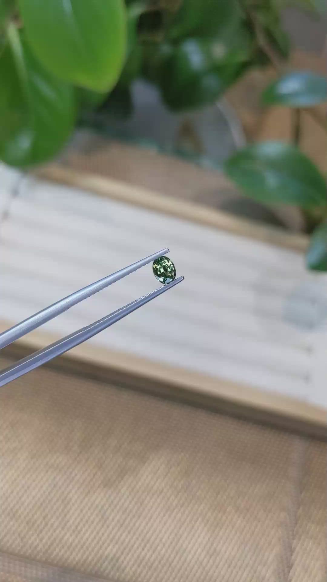 0.49 Ct. Yellowish Green Sapphire from Madagascar Size Video