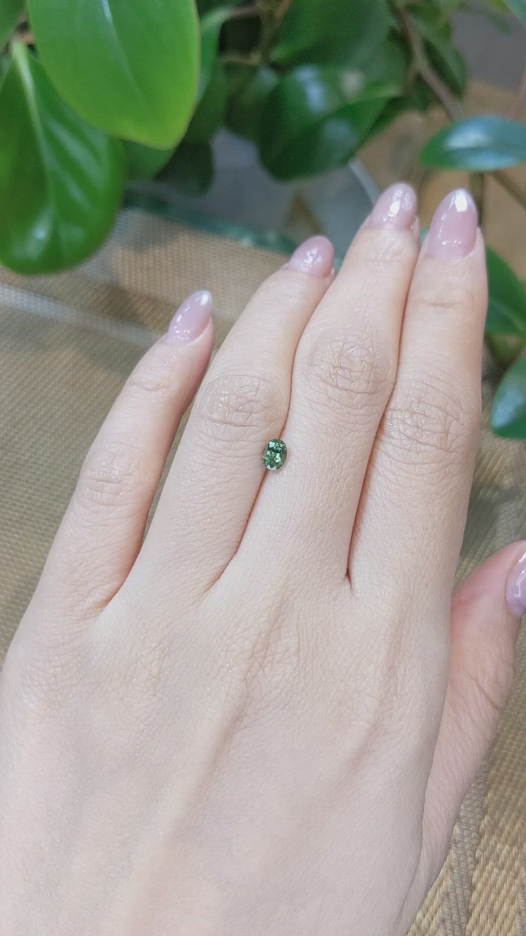 0.56 Ct. Bluish Green Sapphire from Madagascar Size Video