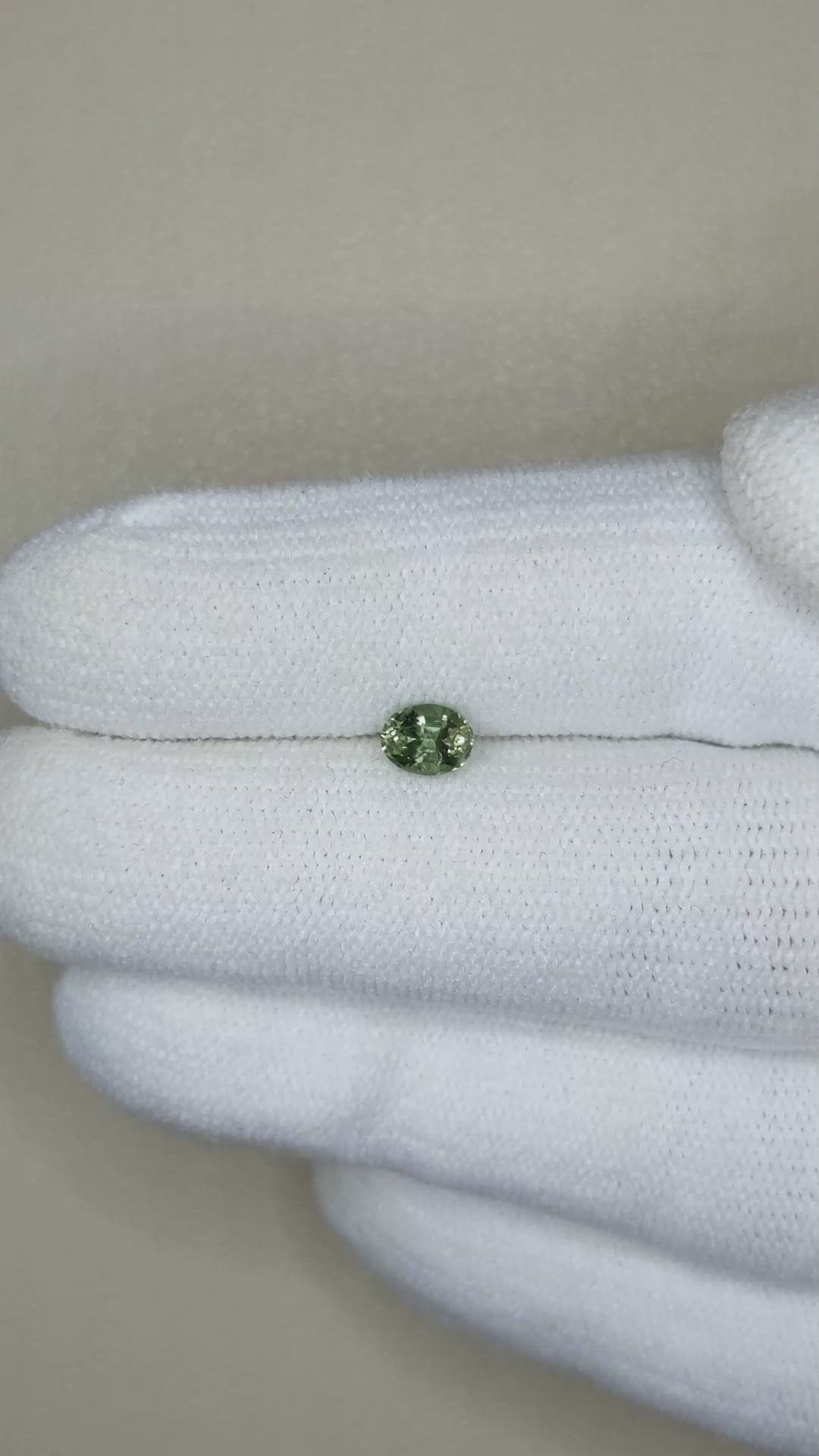 0.56 Ct. Bluish Green Sapphire from Madagascar Size Video