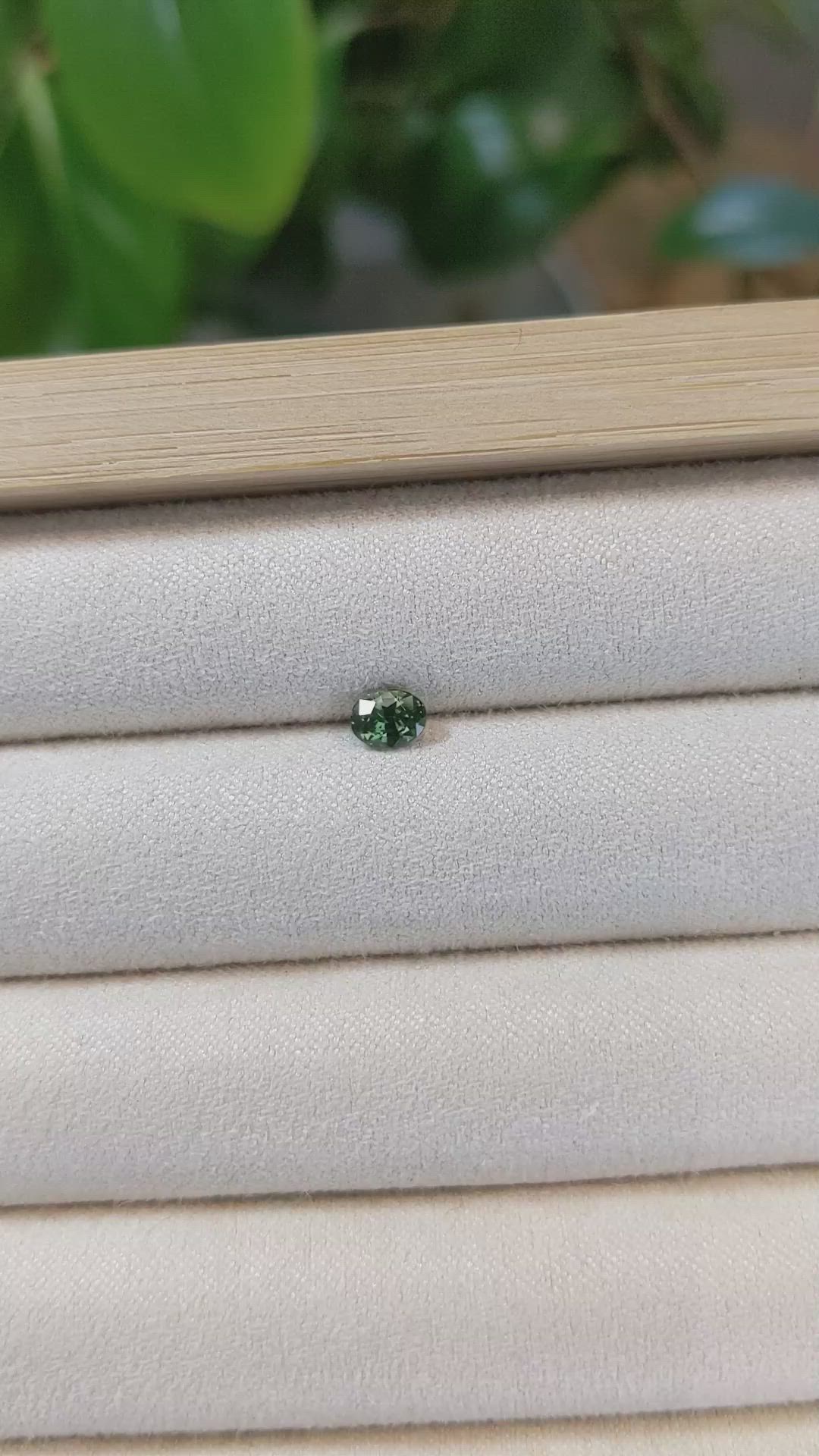 0.56 Ct. Bluish Green Sapphire from Madagascar Size Video
