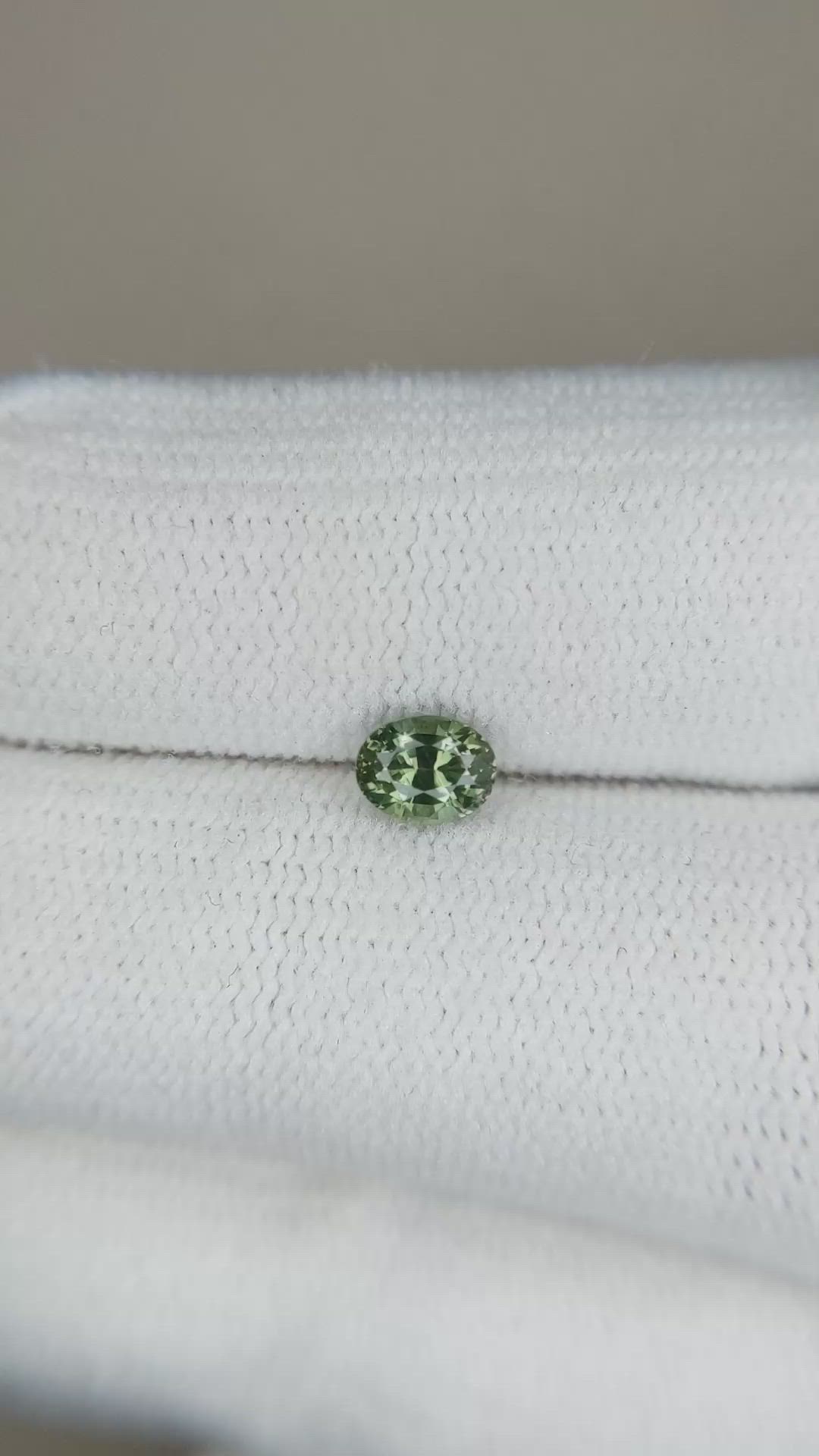 0.56 Ct. Bluish Green Sapphire from Madagascar Size Video