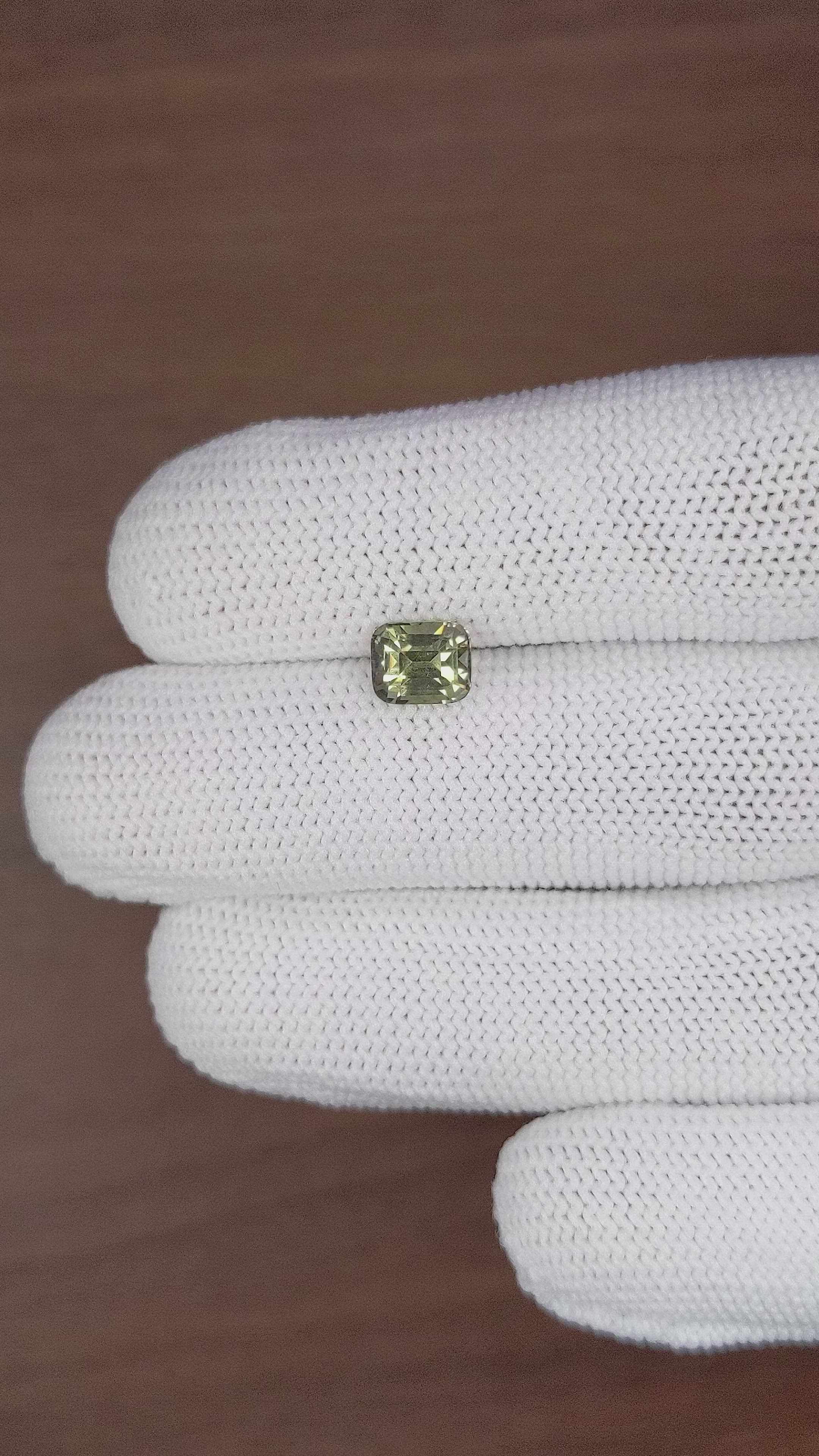 1.85 Ct. Brownish Green Sapphire from Madagascar Size Video