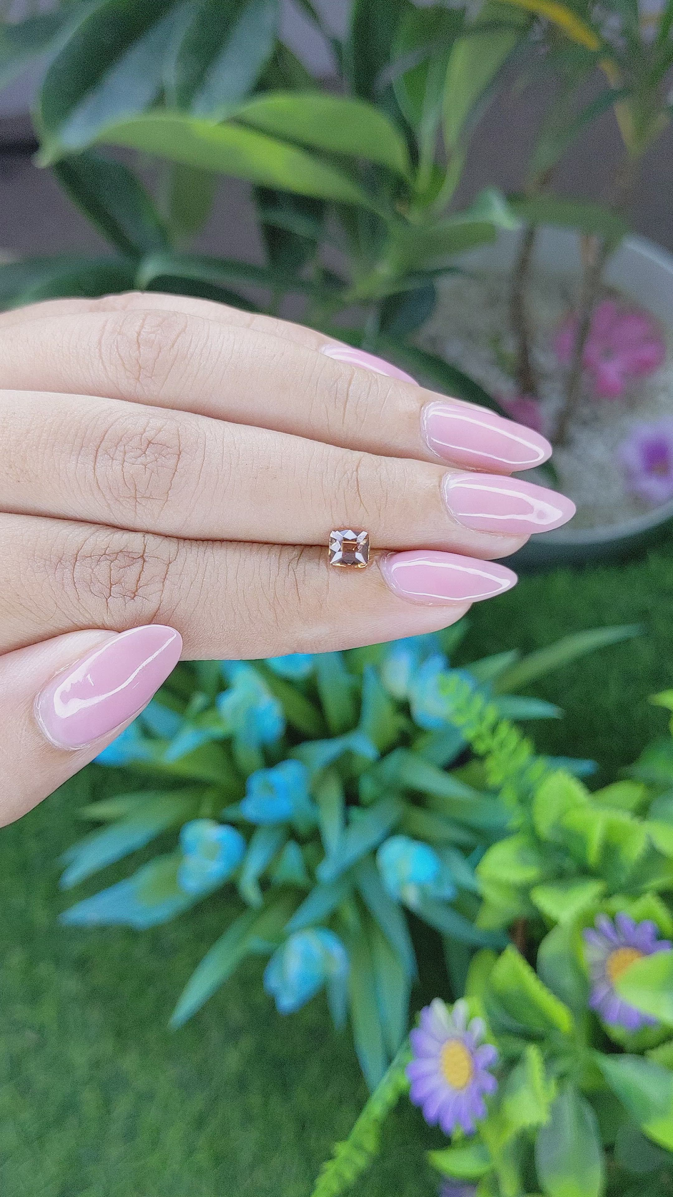 0.72 Ct. Pinkish Brown Sapphire from Madagascar Size Video