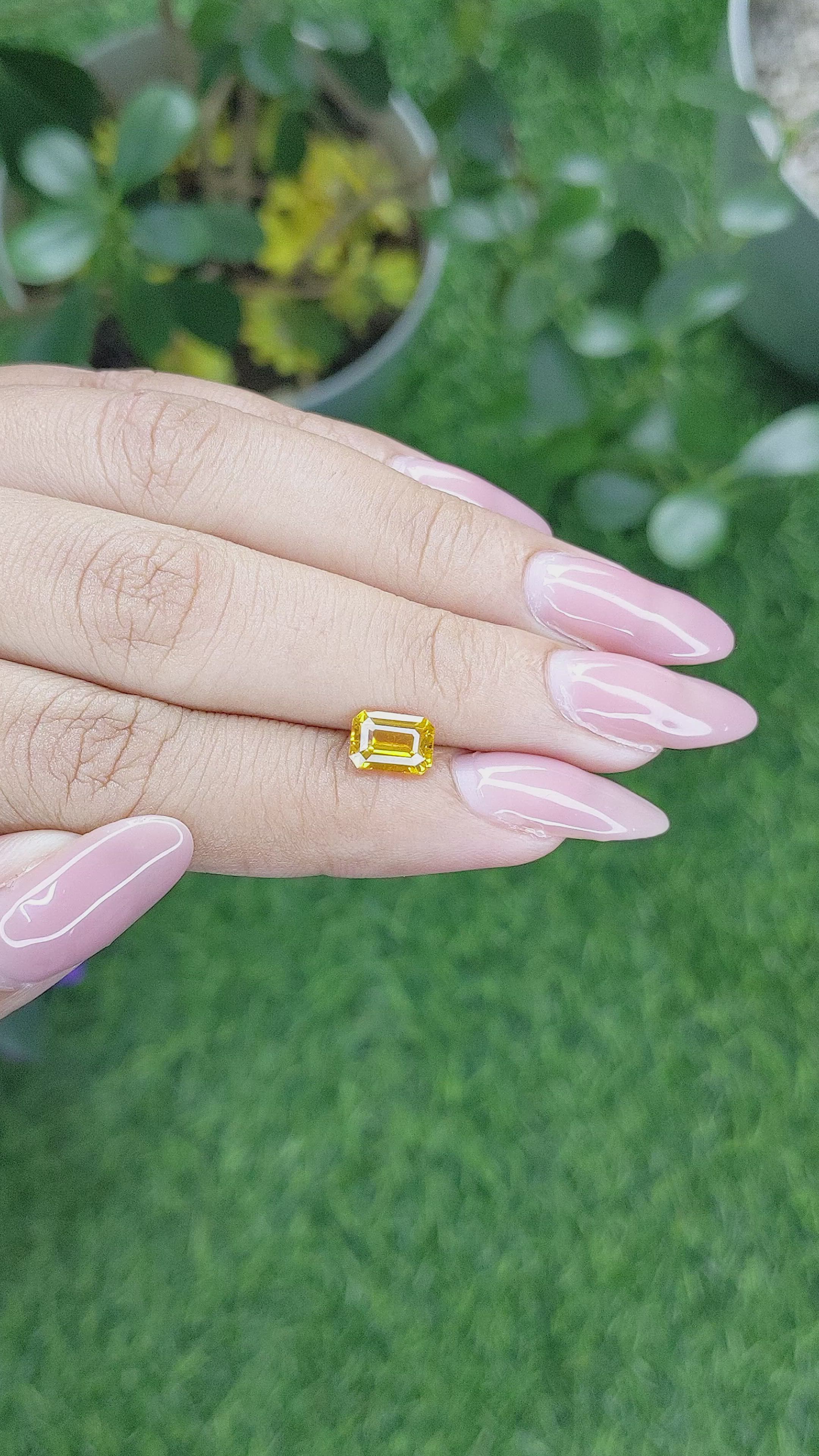 1.60 Ct. Orangish Yellow Sapphire from Ceylon (Sri Lanka) Size Video