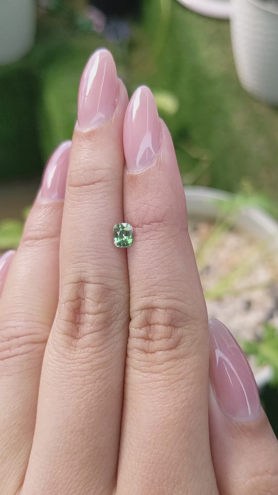 0.57 Ct. Yellowish Green Sapphire from Ceylon (Sri Lanka) Size Video
