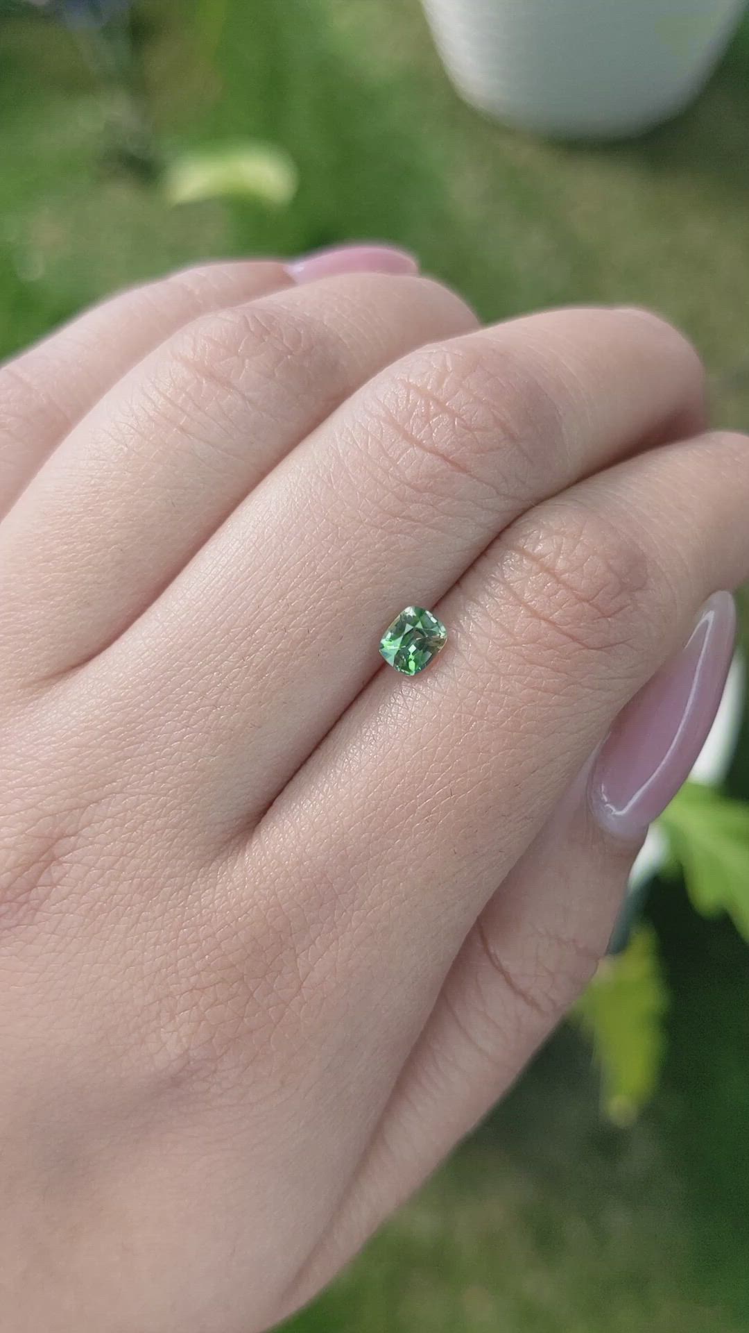 0.57 Ct. Yellowish Green Sapphire from Ceylon (Sri Lanka) Size Video