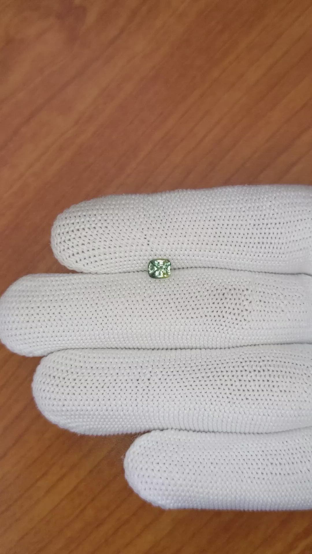 0.57 Ct. Yellowish Green Sapphire from Ceylon (Sri Lanka) Size Video