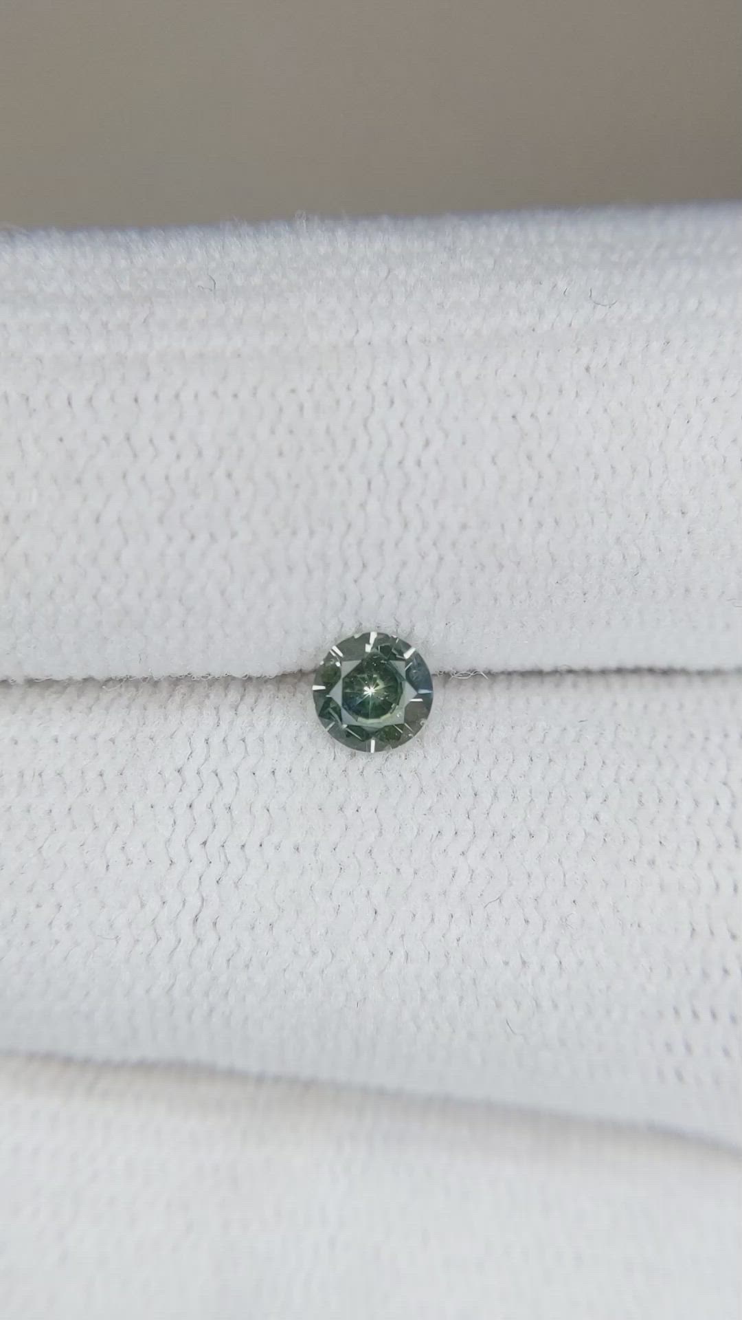 0.26 Ct. Yellowish Green Sapphire from Montana Size Video
