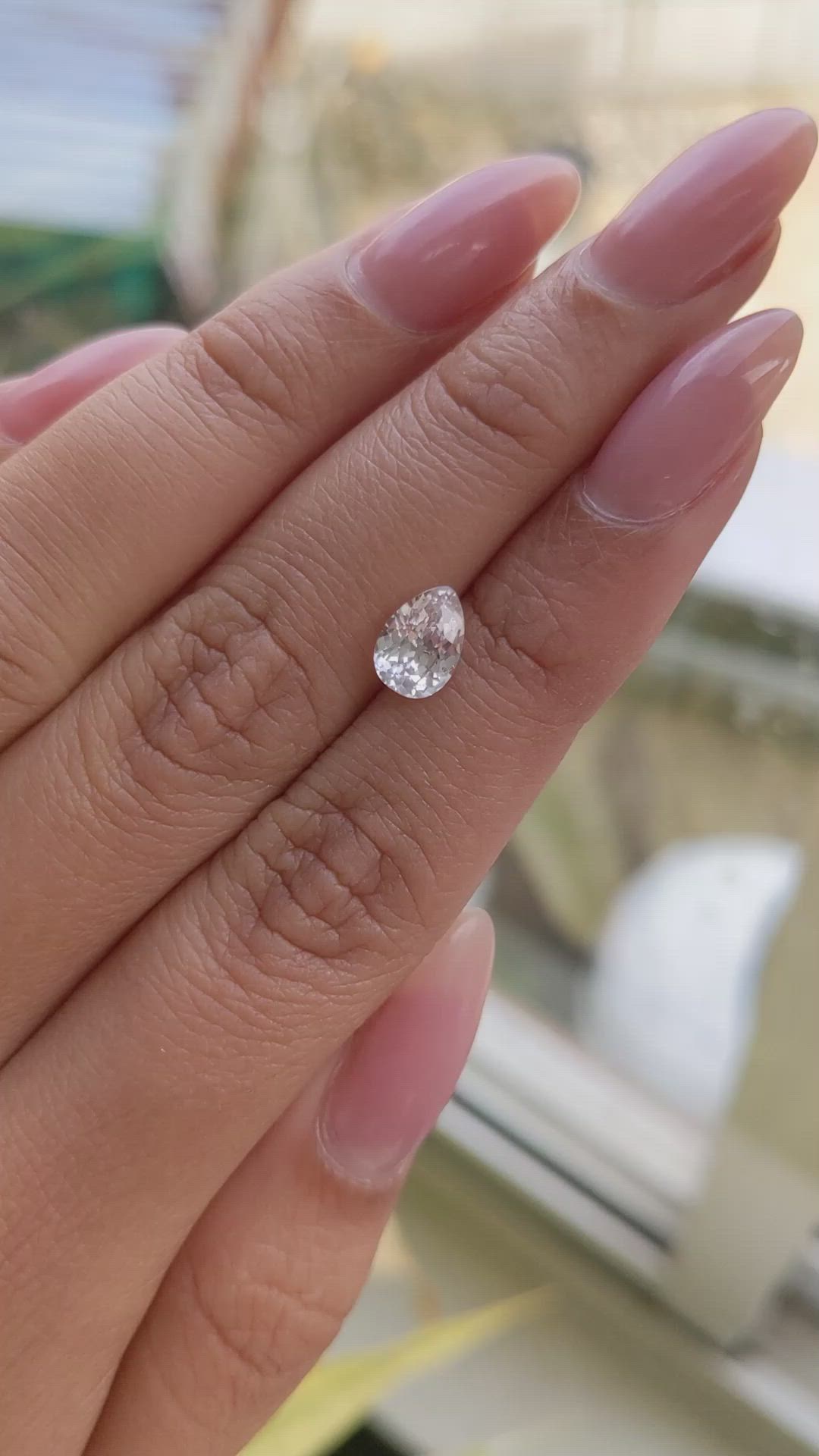 1.27 Ct. Peach Sapphire from Ceylon (Sri Lanka) Size Video