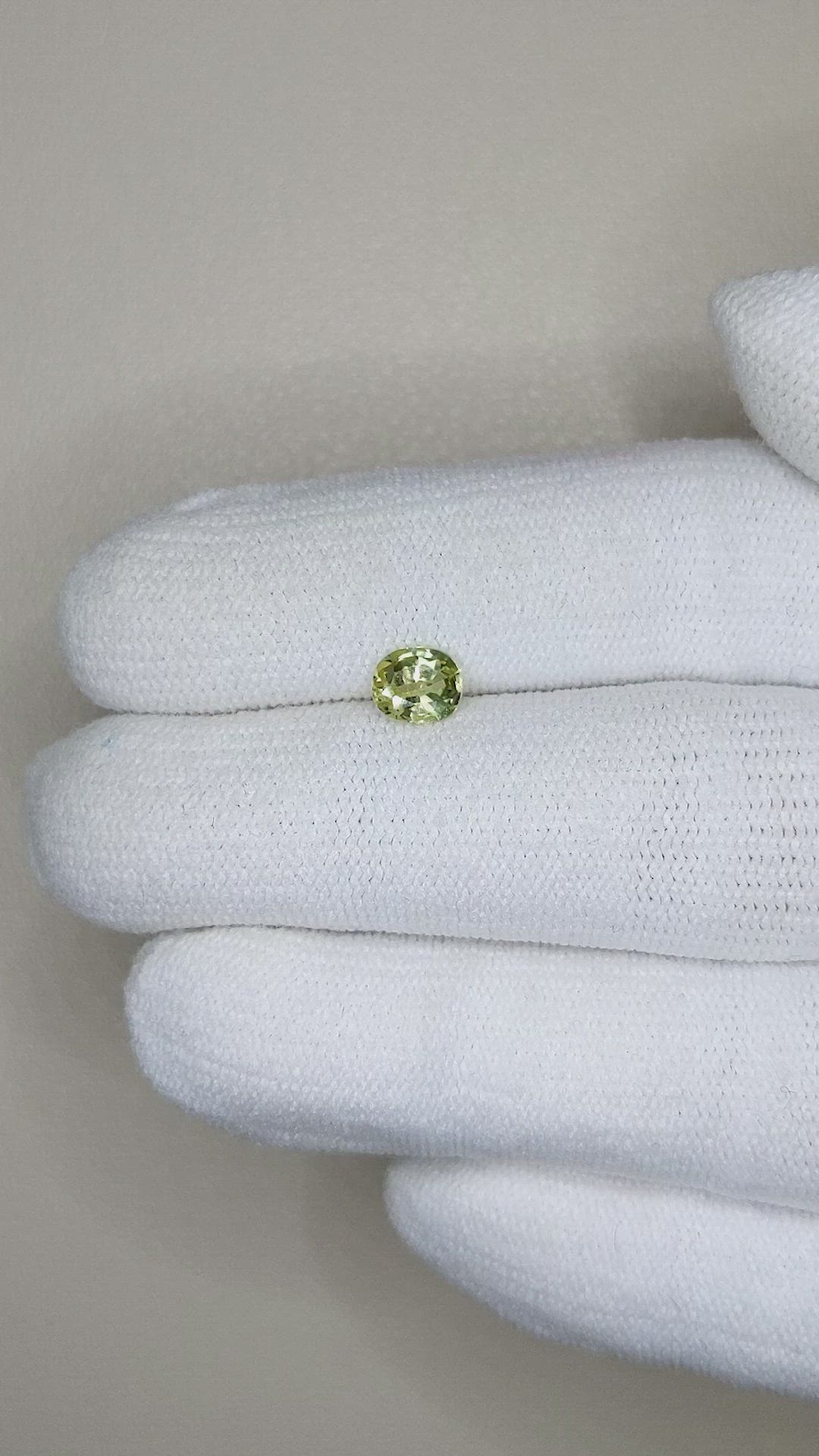 0.71 Ct. Yellowish Green Sapphire from Madagascar Size Video
