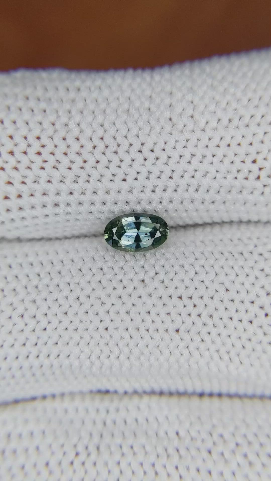 0.55 Ct. Bluish Green Sapphire from Madagascar Size Video