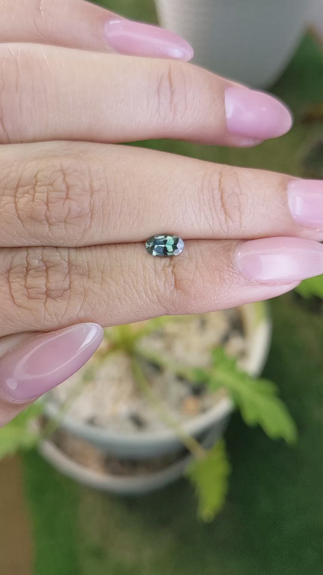 0.55 Ct. Bluish Green Sapphire from Madagascar Size Video