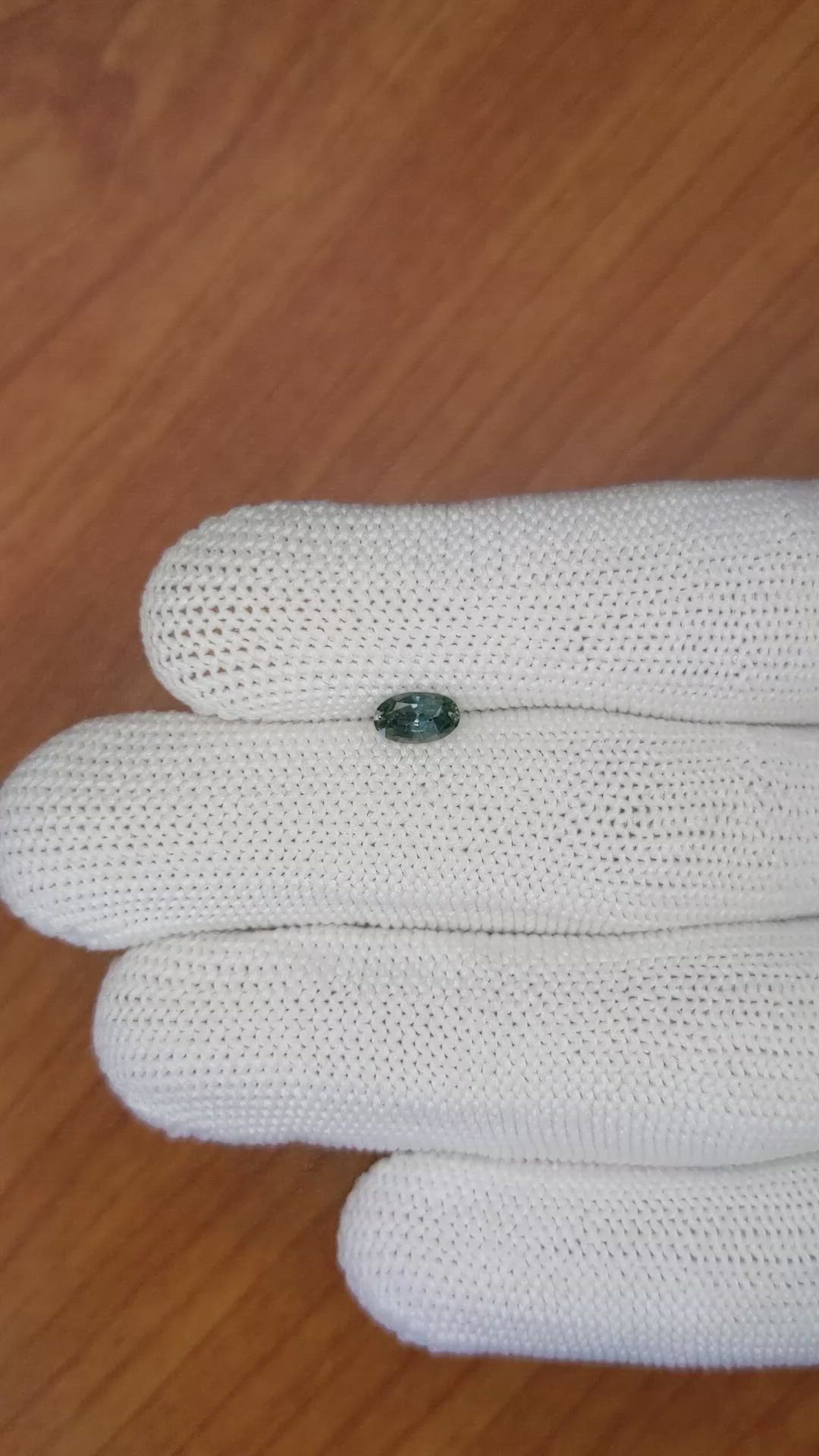 0.55 Ct. Bluish Green Sapphire from Madagascar Size Video