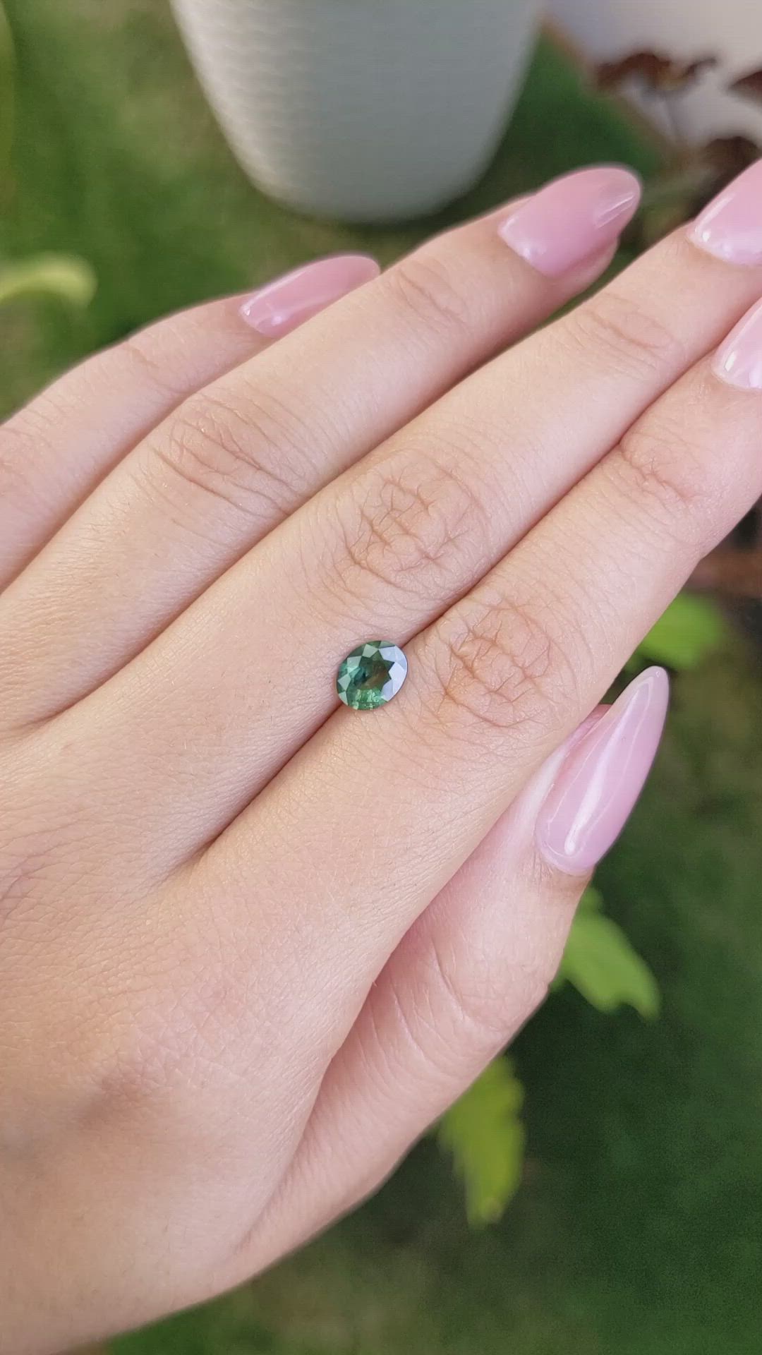 0.88 Ct. Bluish Green Sapphire from Madagascar Size Video