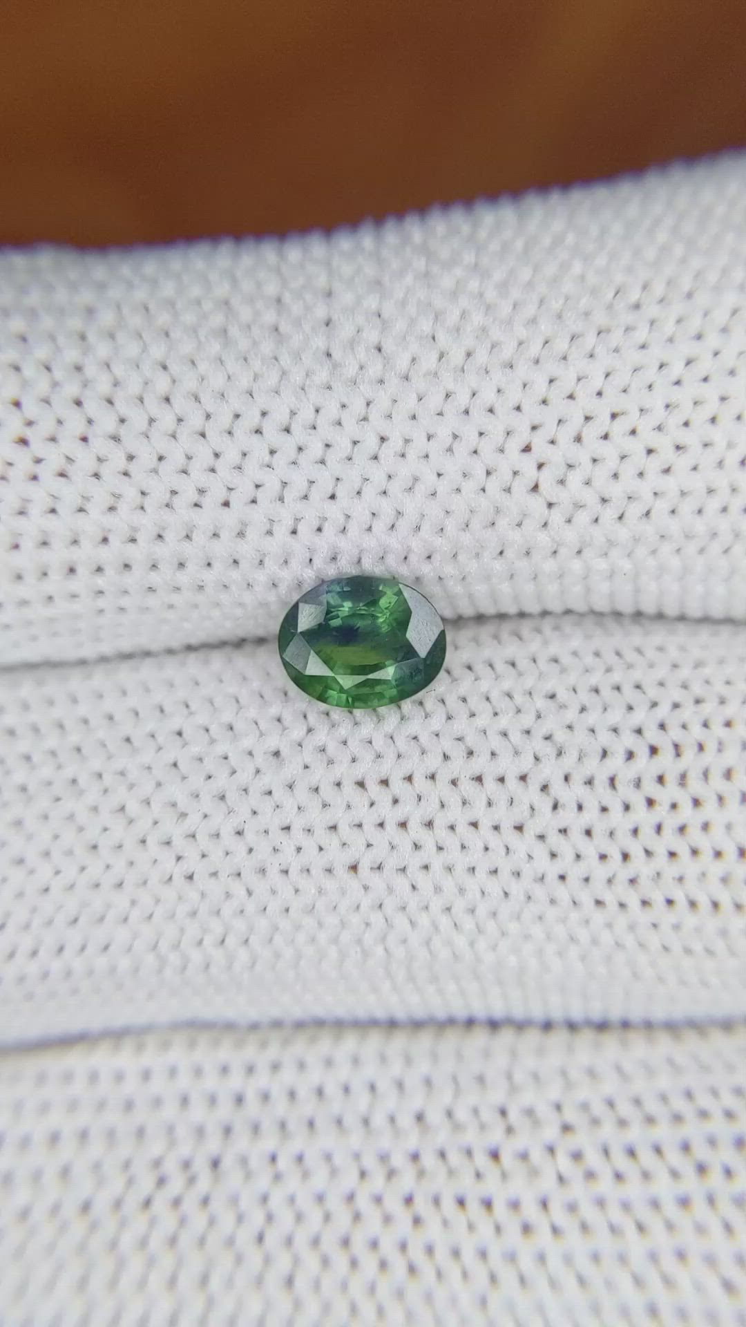 0.88 Ct. Bluish Green Sapphire from Madagascar Size Video