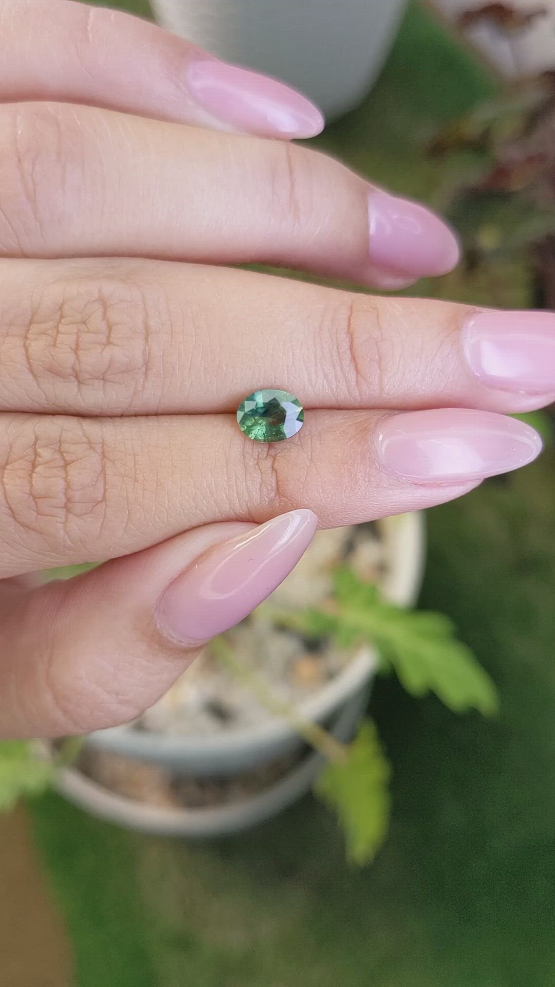 0.88 Ct. Bluish Green Sapphire from Madagascar Size Video