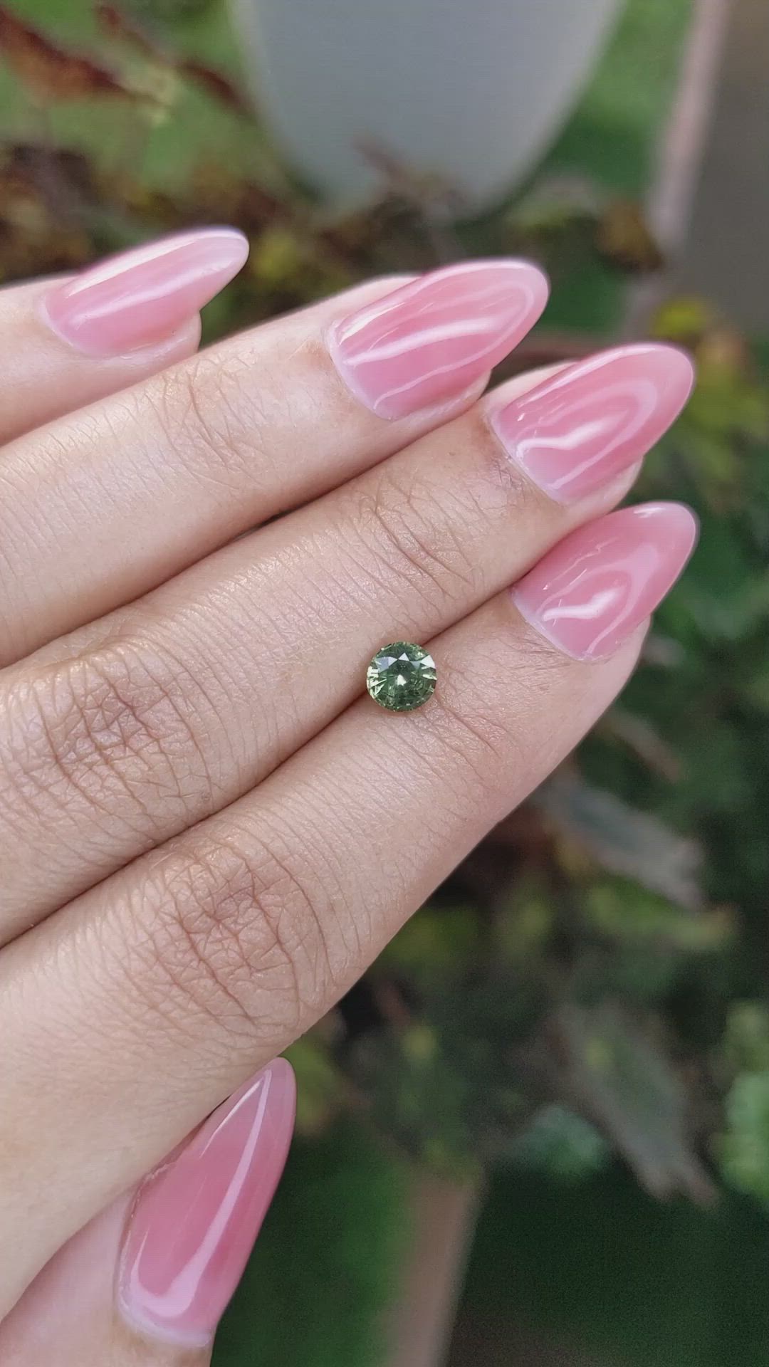 0.71 Ct. Yellowish Green Sapphire from Madagascar Size Video