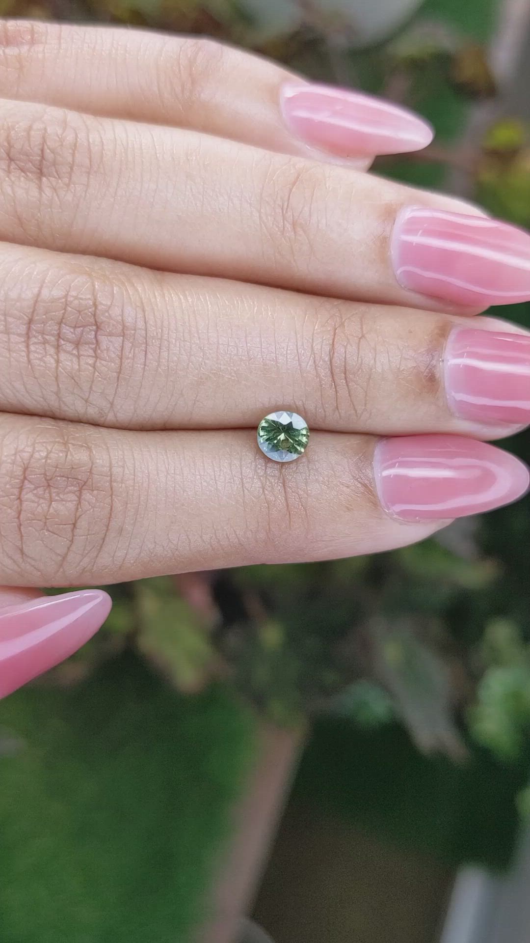 0.71 Ct. Yellowish Green Sapphire from Madagascar Size Video