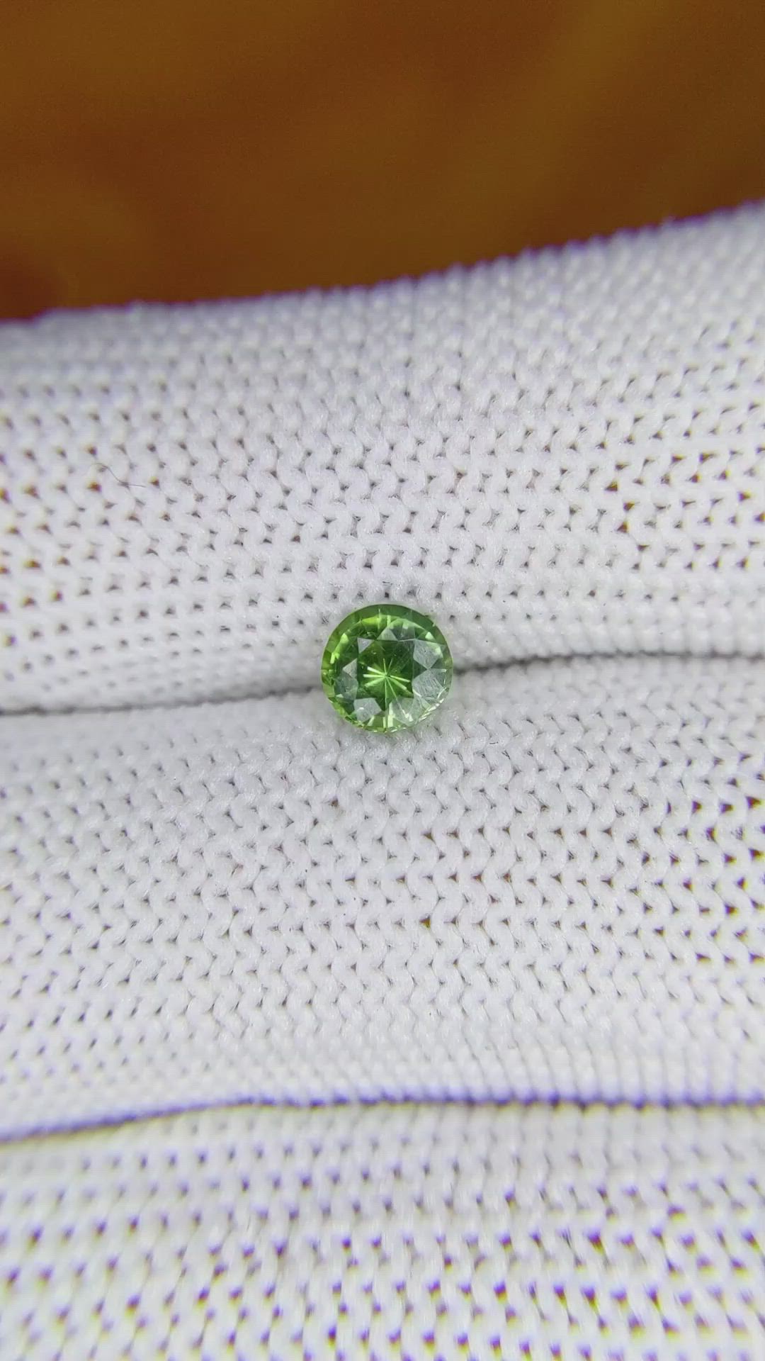 0.71 Ct. Yellowish Green Sapphire from Madagascar Size Video